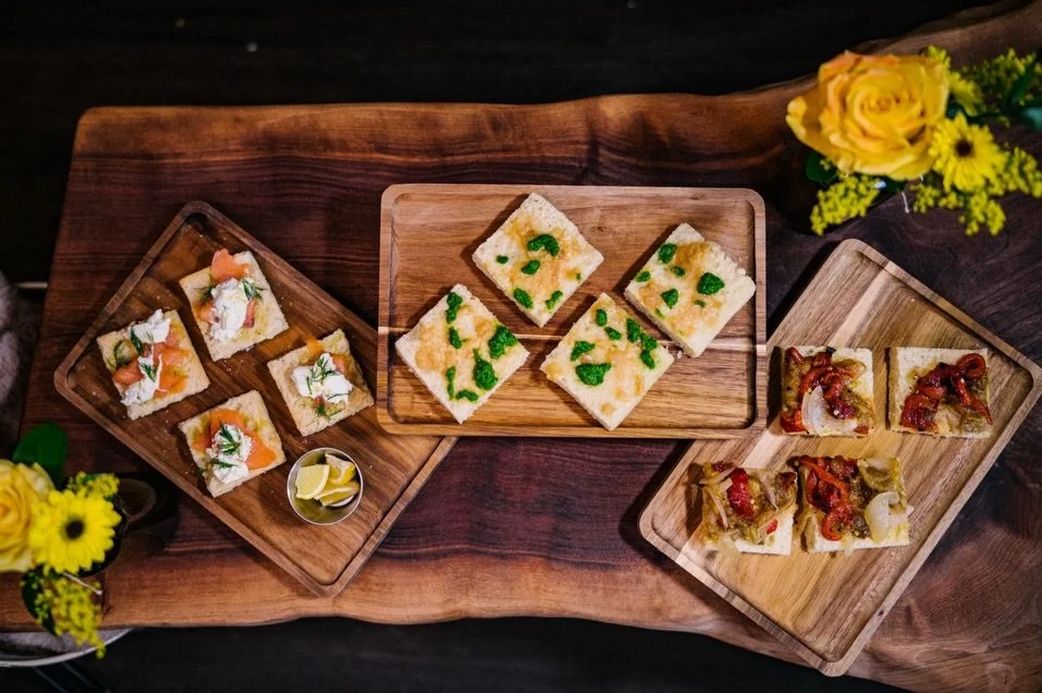 Coca Trio is on.
Left: smoked salmon + burrata + dill. Center: roasted garlic + olive oil. 
Right: escalivada.
Three boards, built to share with a glass of Spanish white.

Wed&ndash;Sat 3&ndash;10pm | 328 N Tower Ave | 21+
Walk in or reserve &mdash; 