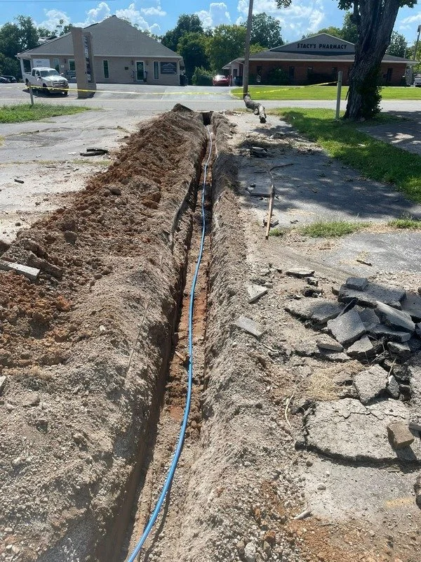 Commercial excavation and trenching for underground infrastructure in McMinnville, Tennessee.