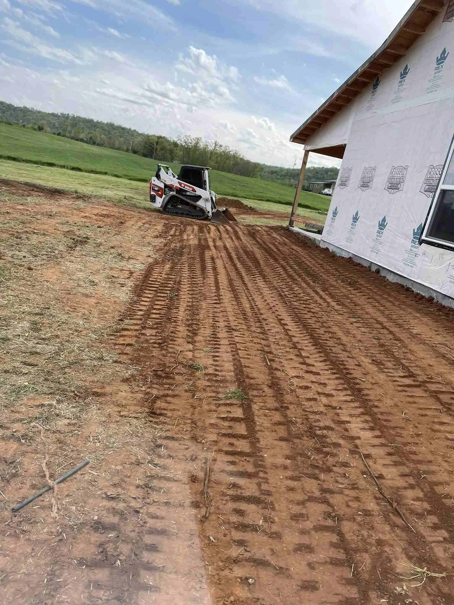 Land grading and leveling on new construction to correct slope and improve drainage in Middle Tennessee