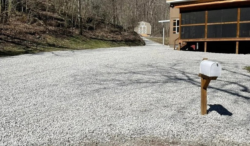 Gravel driveway grading and ¾ inch gravel installation in Woodbury, TN