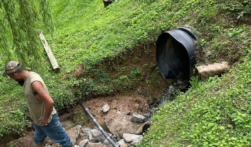 Drainage system and erosion control installation to prevent flooding and stabilize soil.