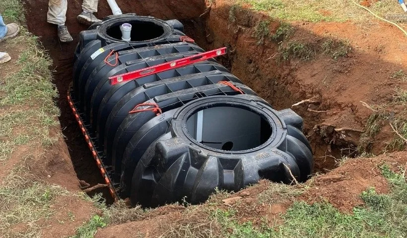 Septic tank installation and excavation service for residential property in McMinnville, Tennessee.