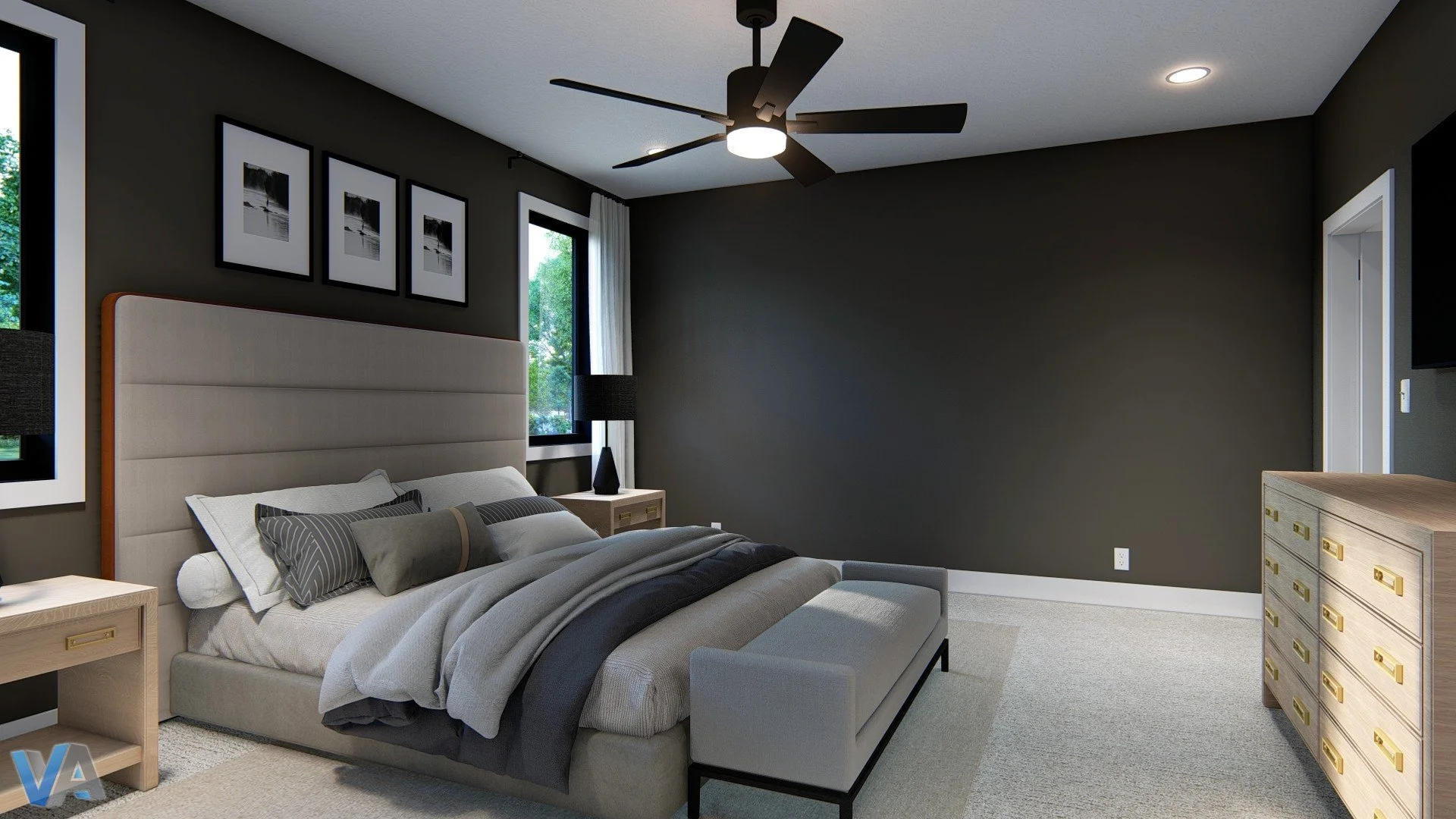 Modern bedroom with dark gray walls, a beige upholstered bed with a bench at the foot, and a tall light wood dresser. There is a black ceiling fan, two windows with white curtains, and framed black and white landscape art above the bed. The room has a beige carpeting and minimalist decor.