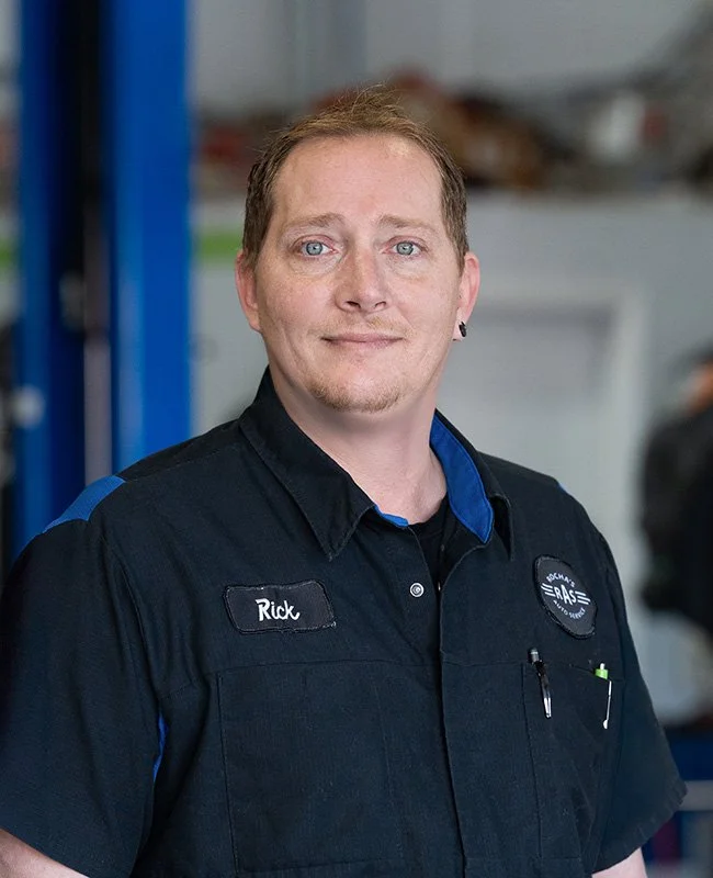 Skilled mechanic in Redding CA working on advanced hybrid systems