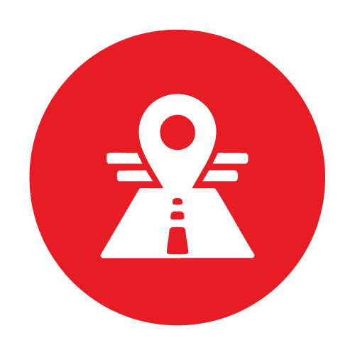 Navigation or map pin icon over a stylized road on a red circular background representing Rochas Auto Service in Redding and Anderson, California