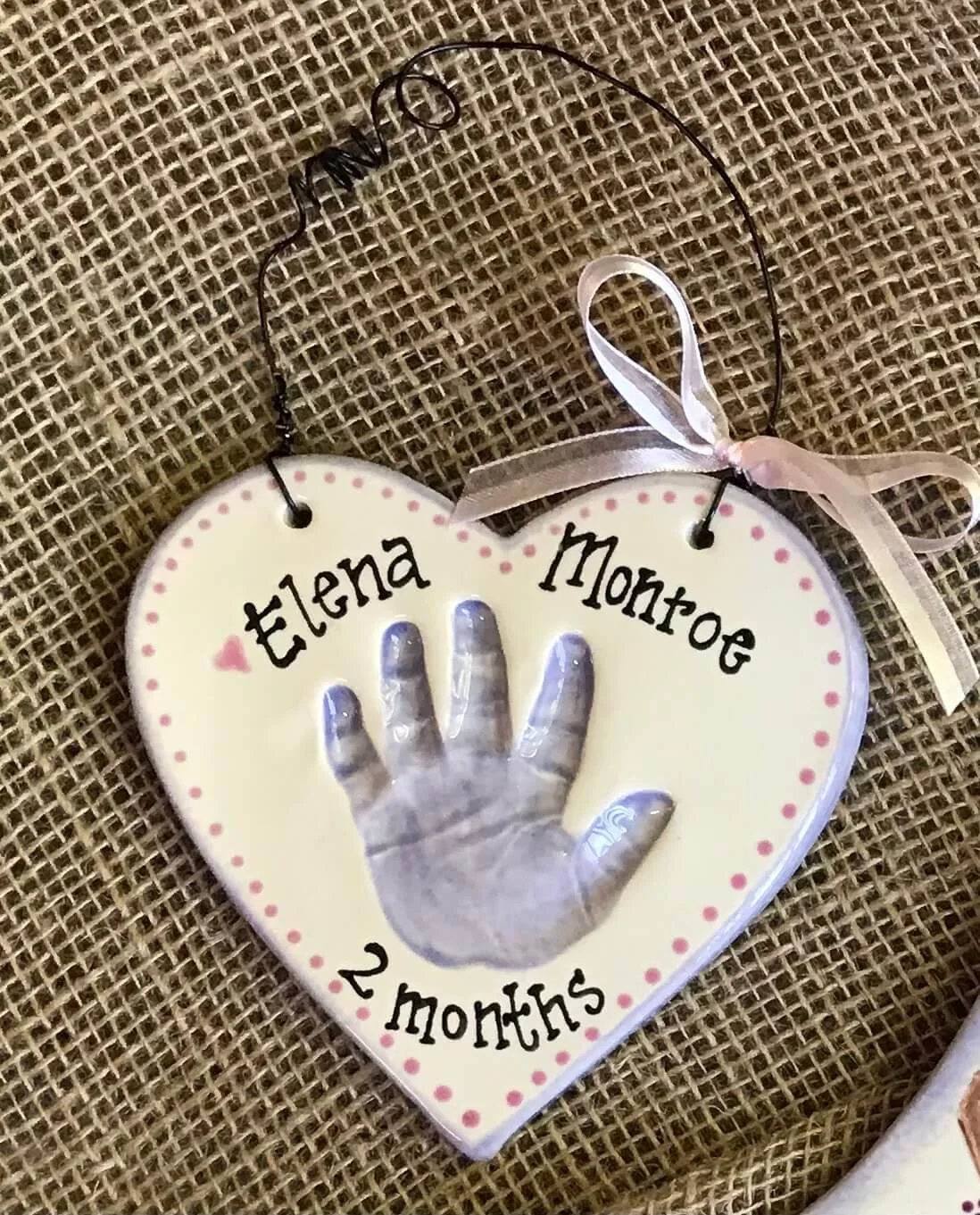 Heart ornament with a hand impression