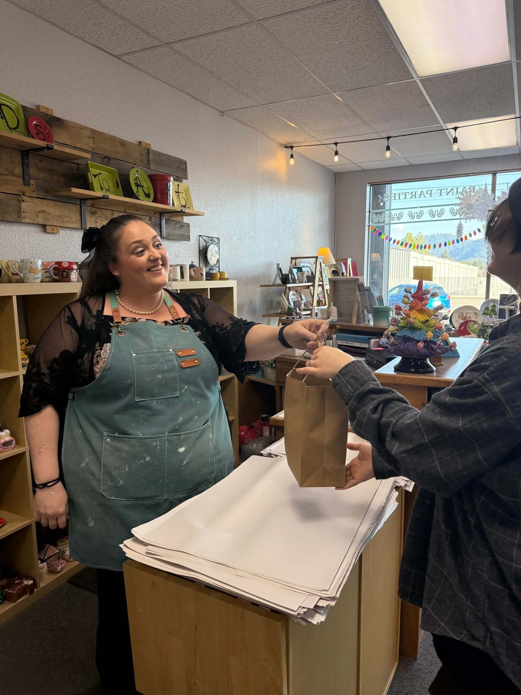 A painted cookie jar sits on a shelf