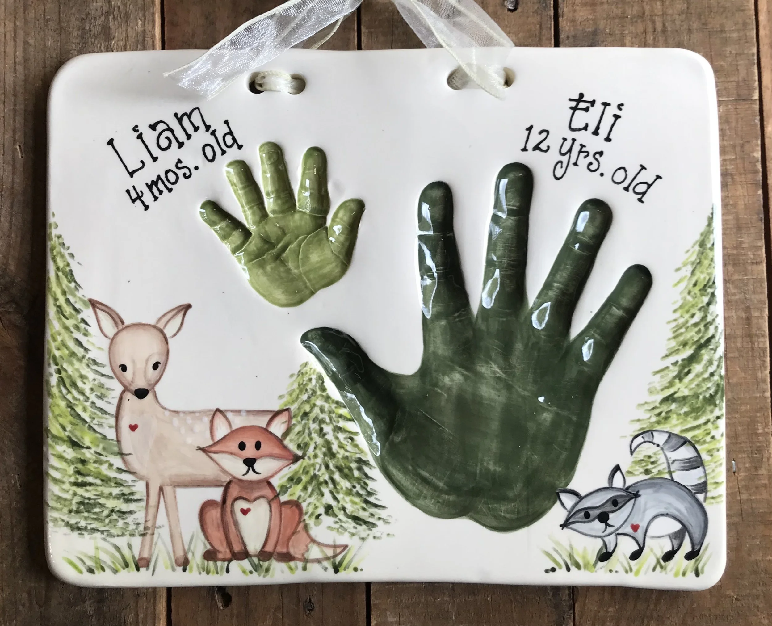 Finished green clay impressions of hands