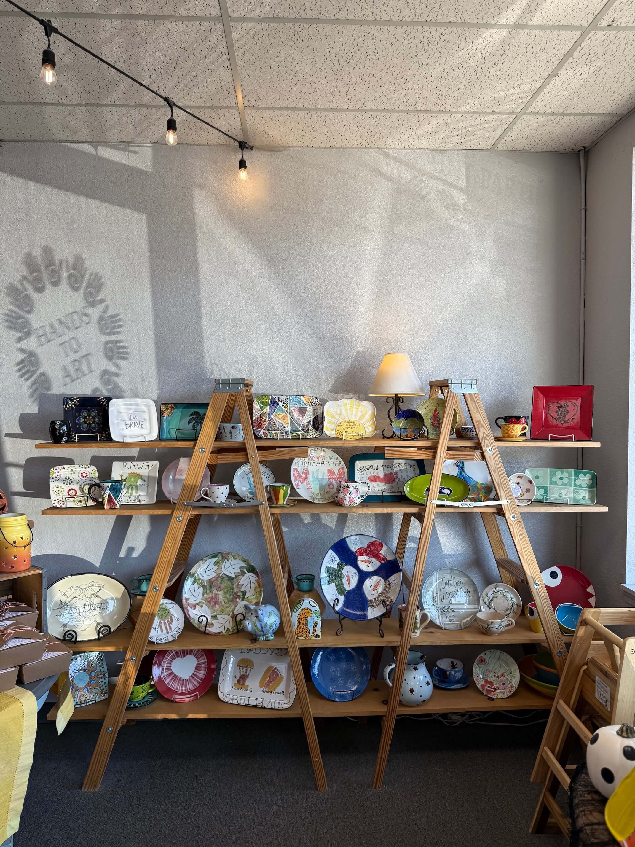Shelves of finished pottery pieces