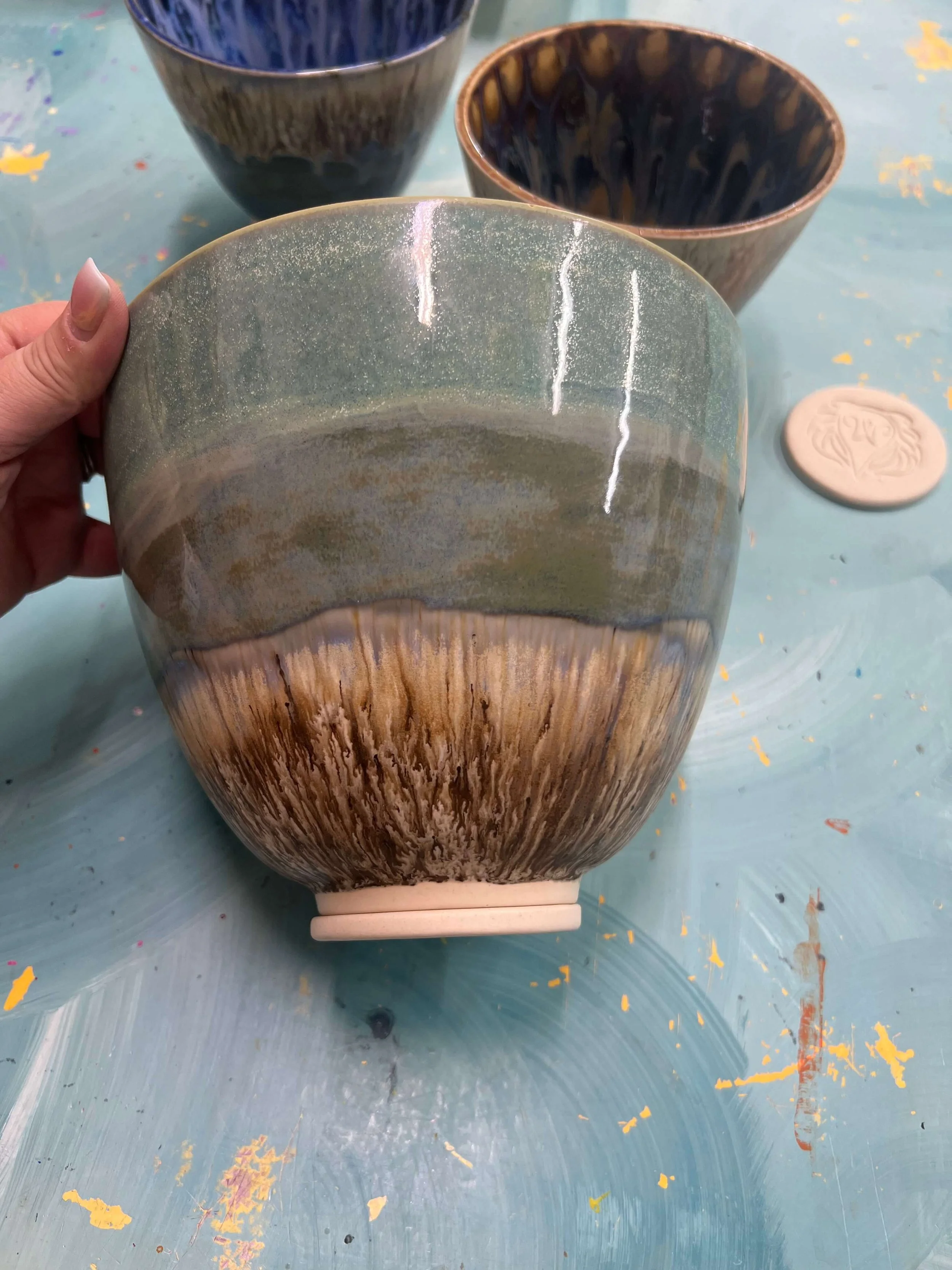 Finished stoneware in teal and brown