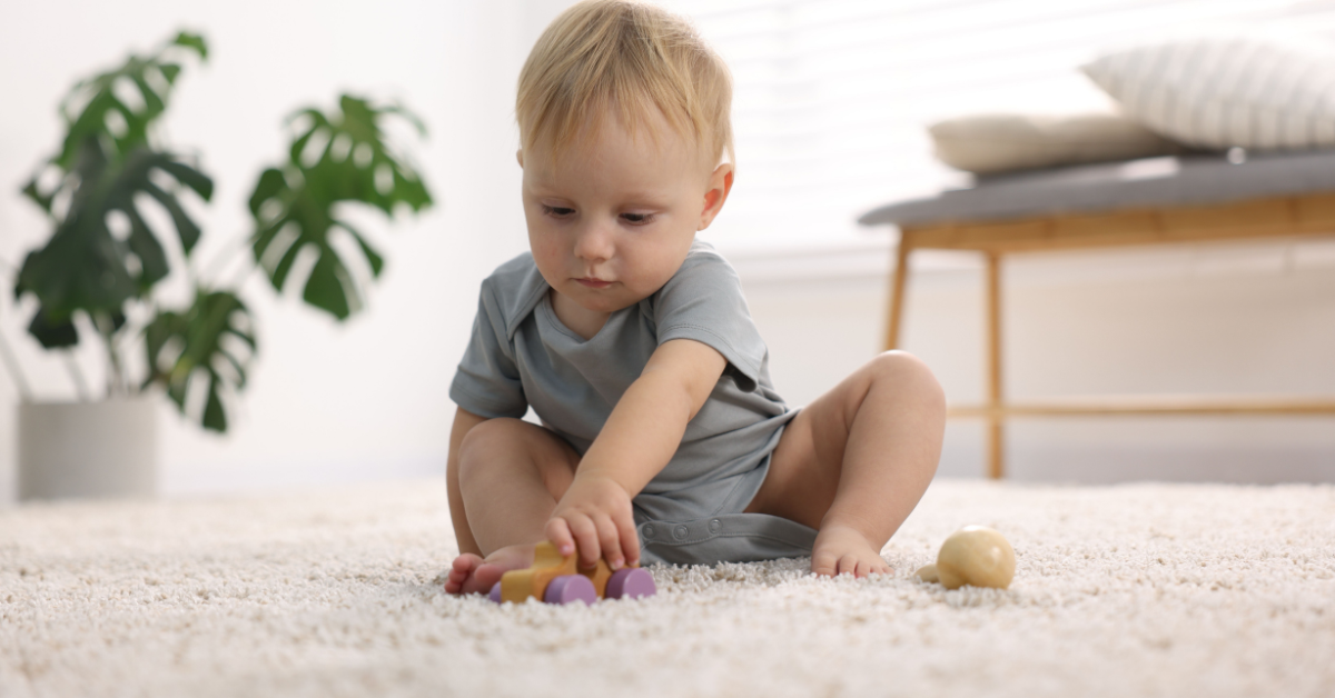 Baby playing on freshly cleaned carpet in a Boise home