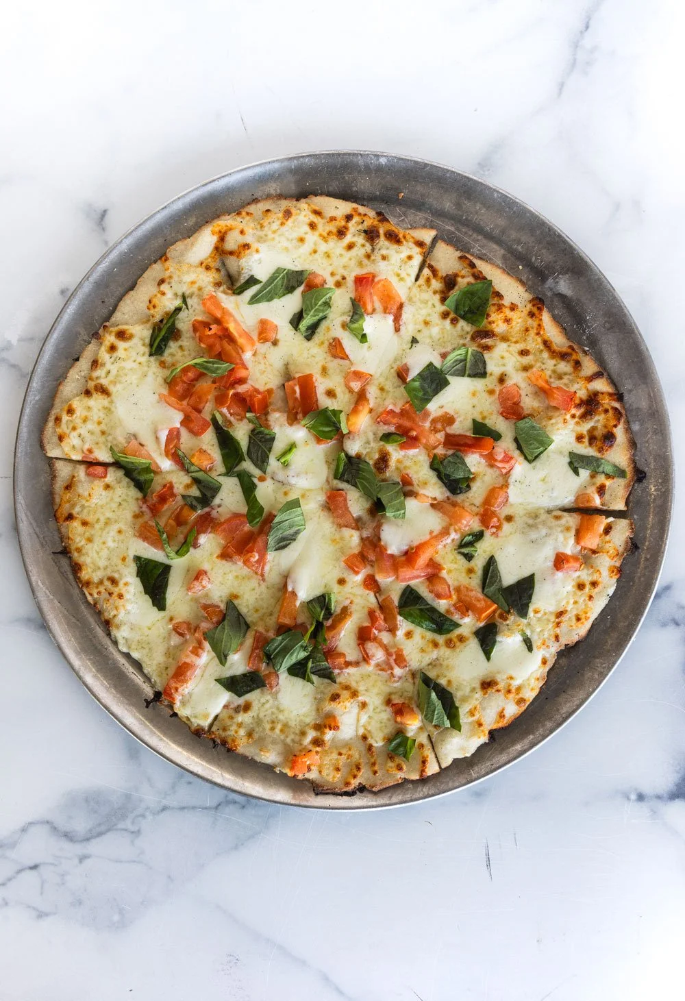 Fresh gluten-free pizza and breadsticks served at TRU Pizza Co. in Wyandotte, MI.