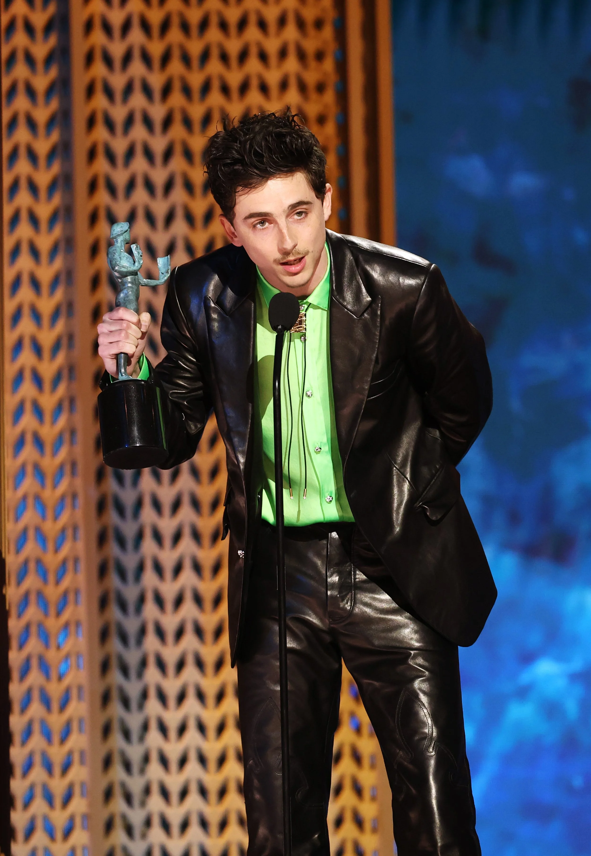 Timothée Chalamet accepting an Actor award at the Screen Actors Guild Awards.