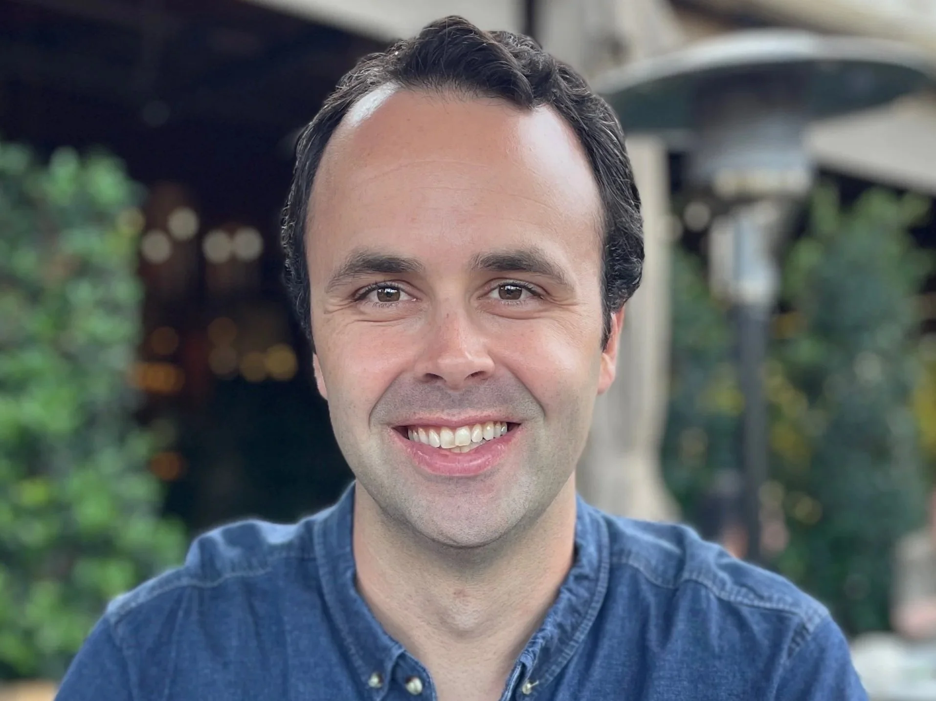 Madigan Stehly sitting on a patio.