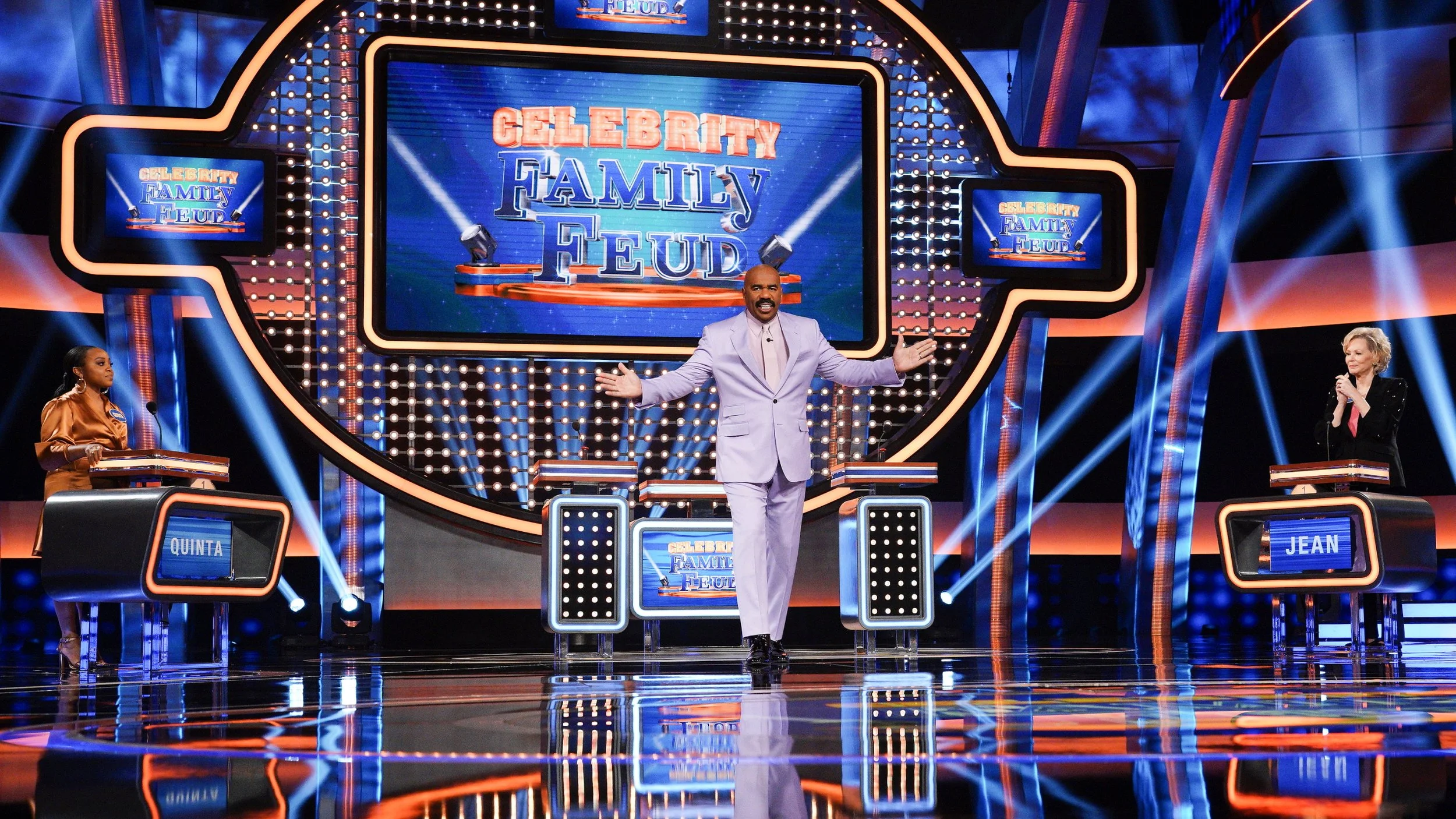 Steve Harvey entering the stage on Celebrity Family Feud.