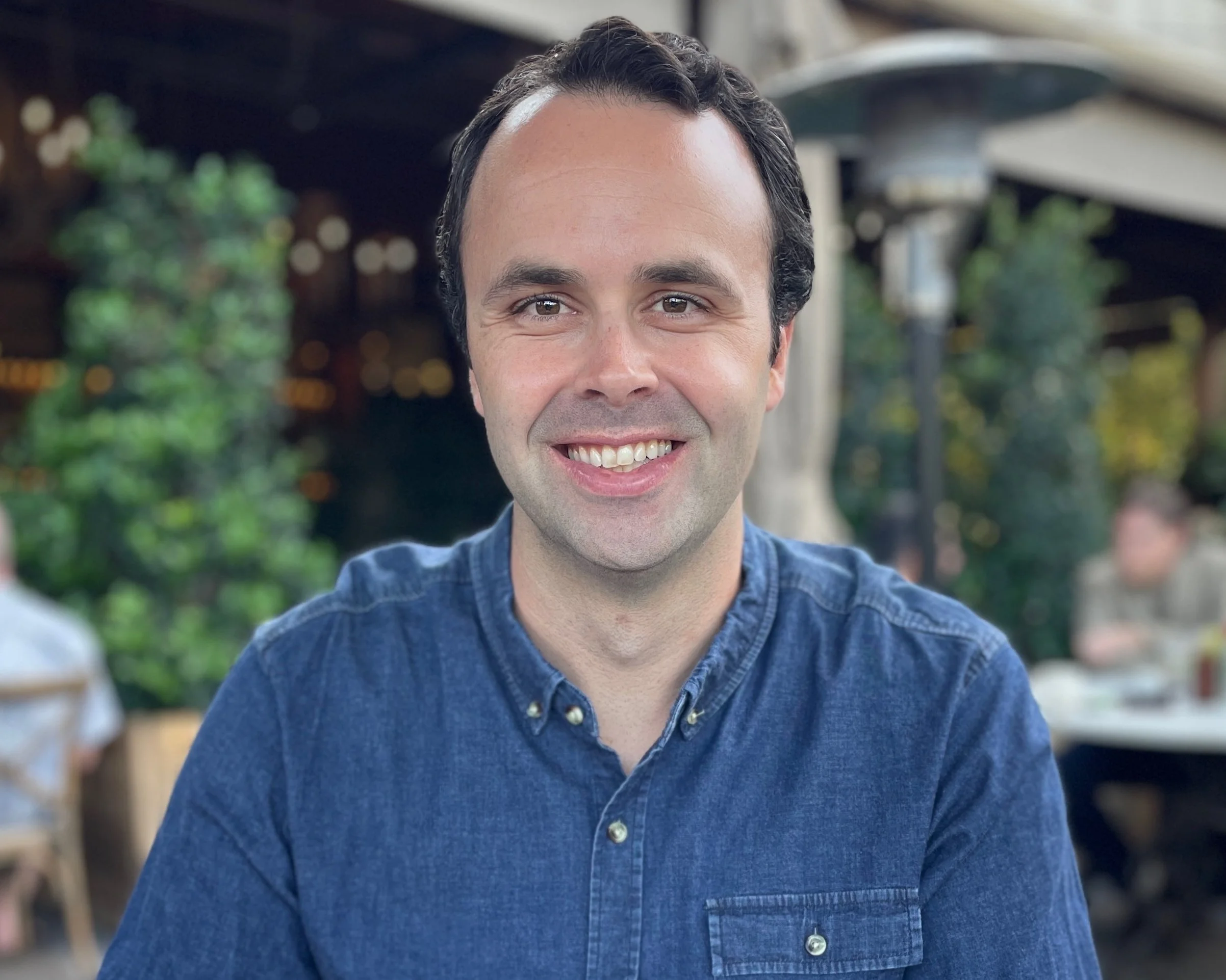 Madigan Stehly sitting on a patio.
