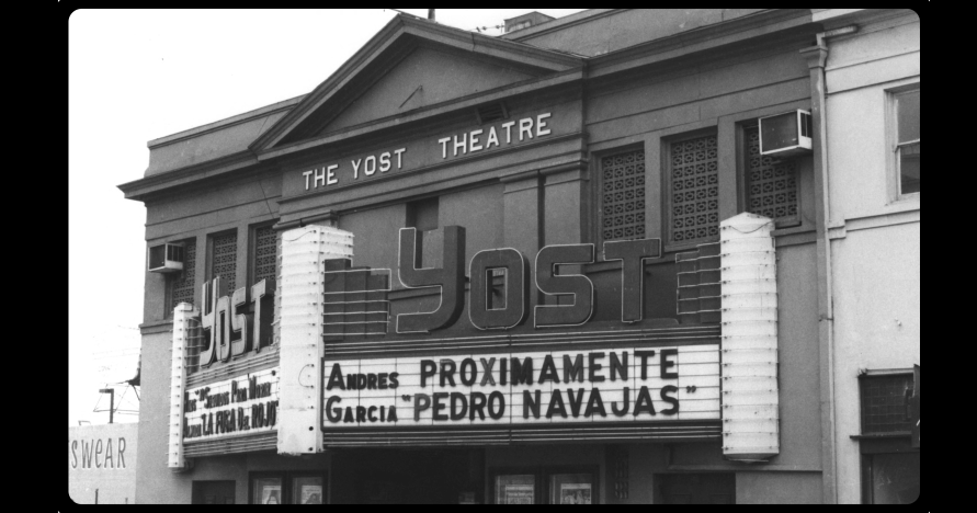 Black and white photo of the Yost Theatre with a marquee displaying upcoming shows, including performers Andres Proximamente Garcia, Pedro Navajas.