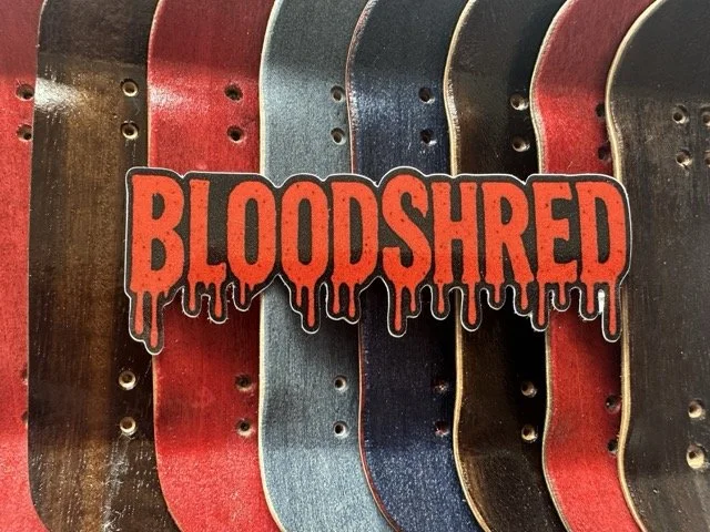 Colourful BloodShred decks with a BloodShred Logo sticker
