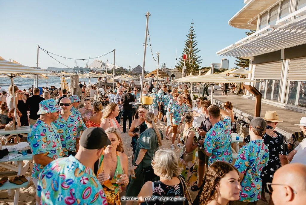 Guests at a private party on the sand in the licensed beach area at Bathers Beach House, Fremantle. Photo: Damo Photography