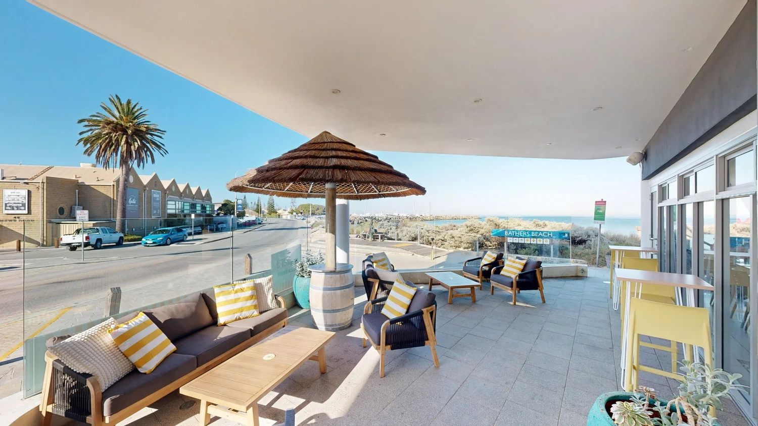 Southern Alfresco couches and high bar tables at Bathers Beach House