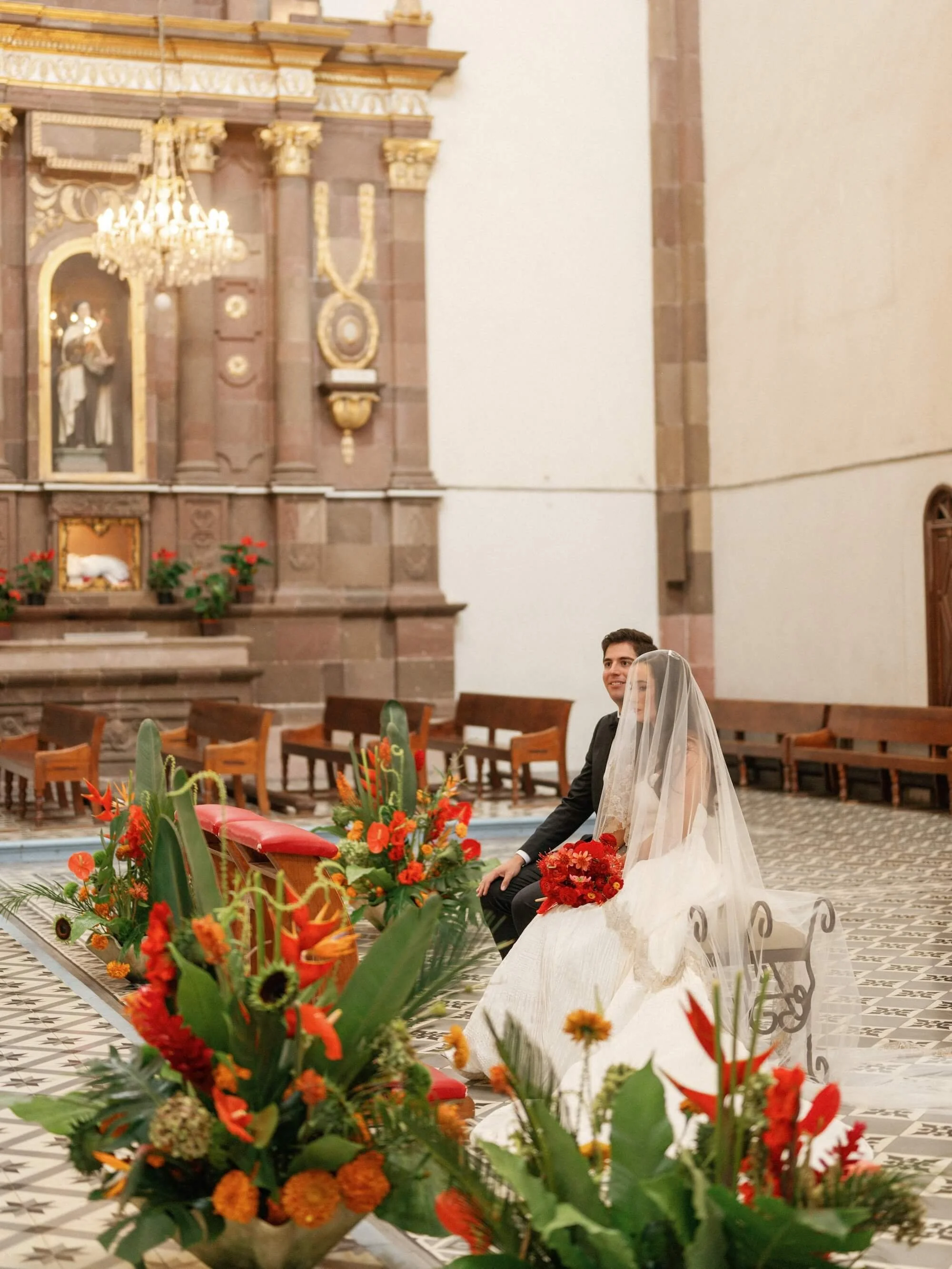 a serene ceremony setting enriched by refined floral elements