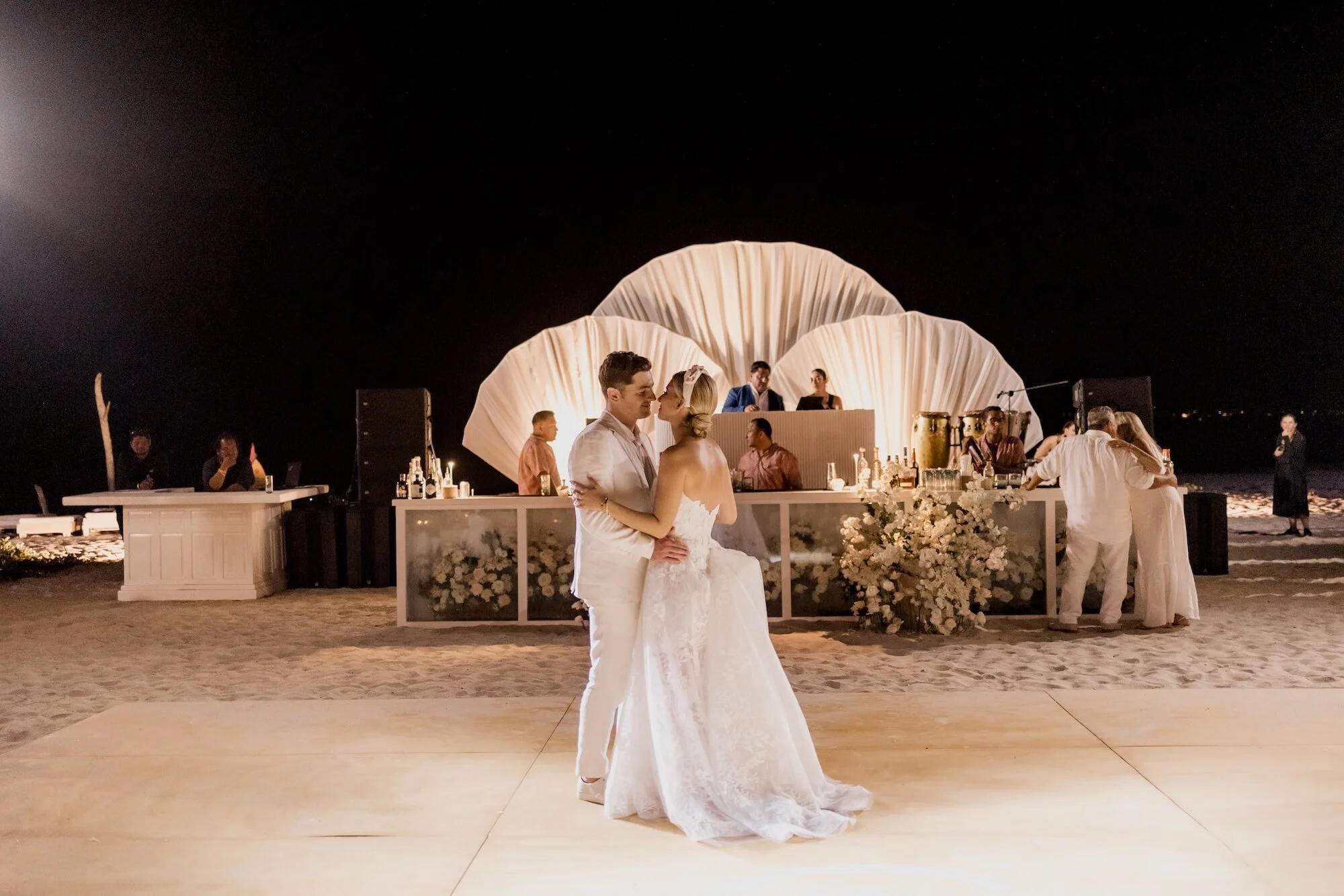 fleeting wedding moment captured within a floral setting