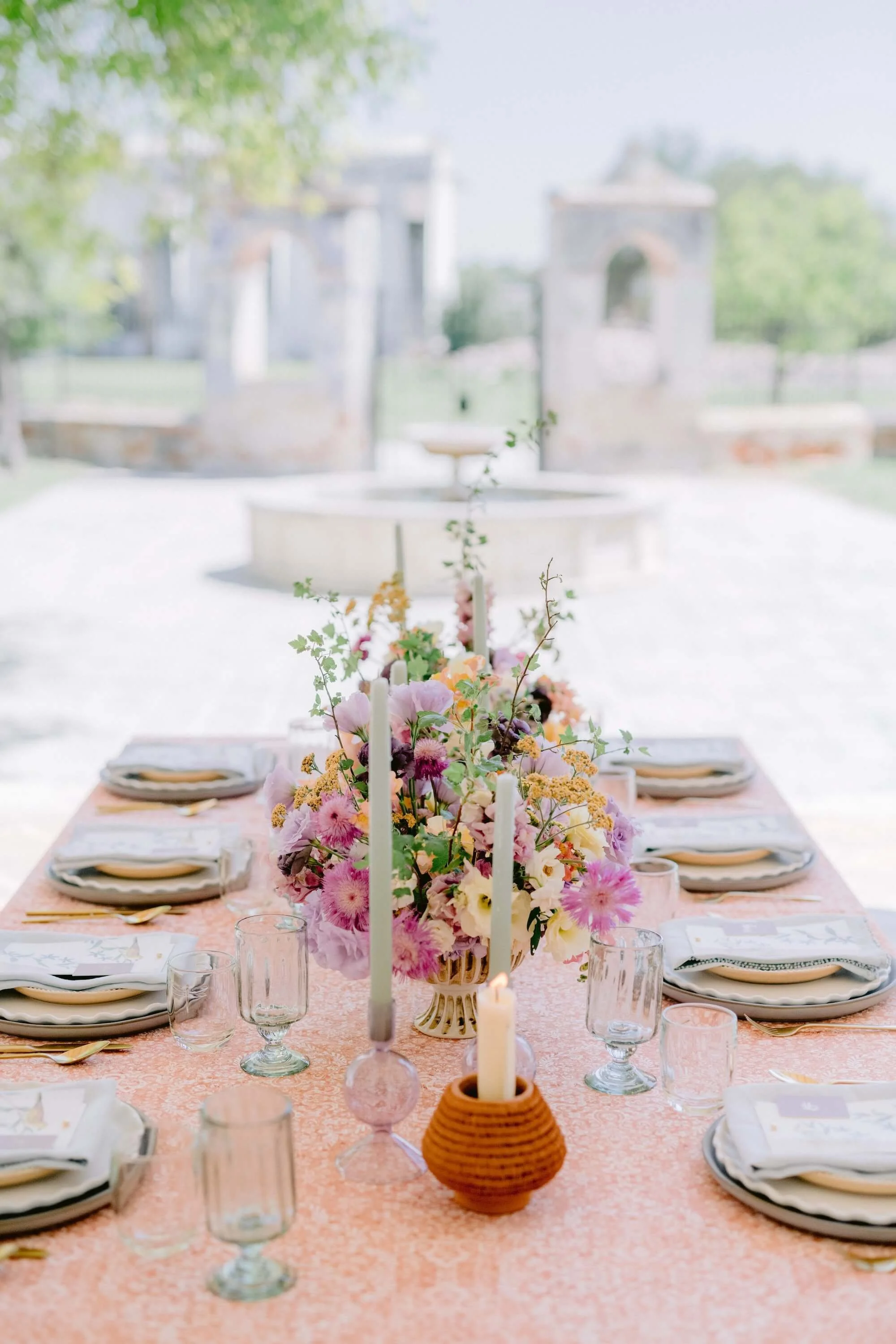 elegant outdoor wedding reception setup with refined floral design by Florklor