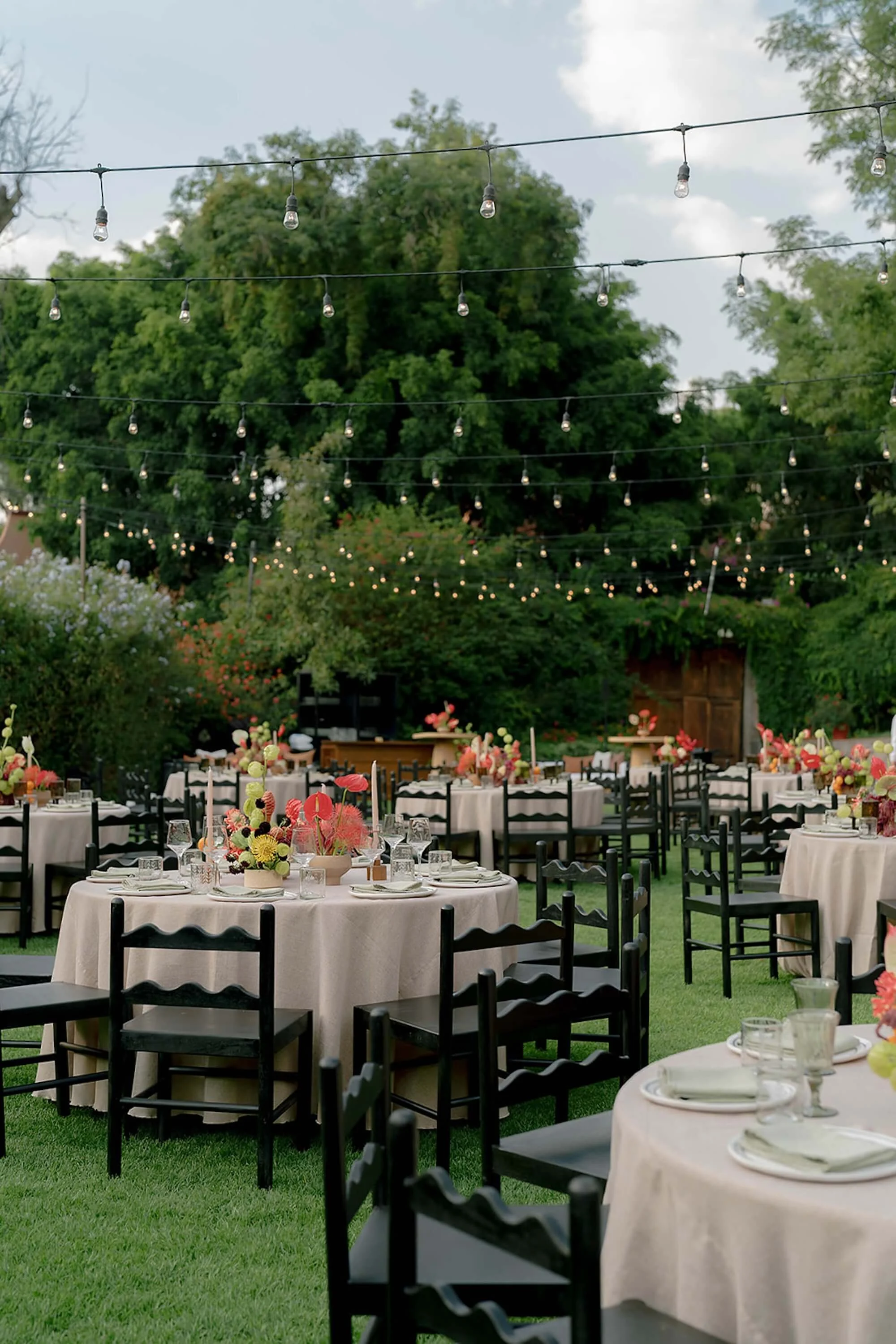 an elegant dinner setting enriched by soft floral layers