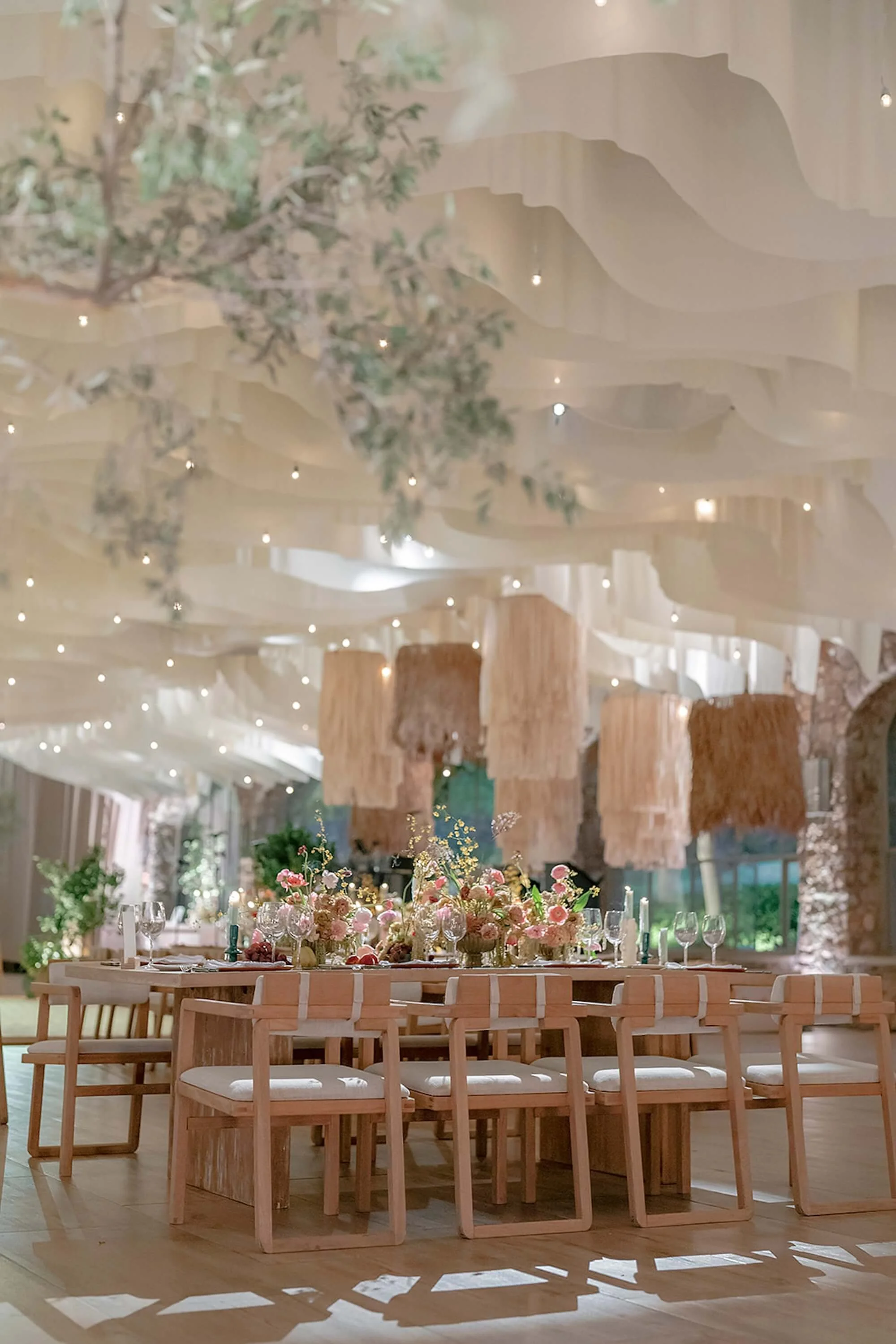 guests gathered within a refined floral dining experience