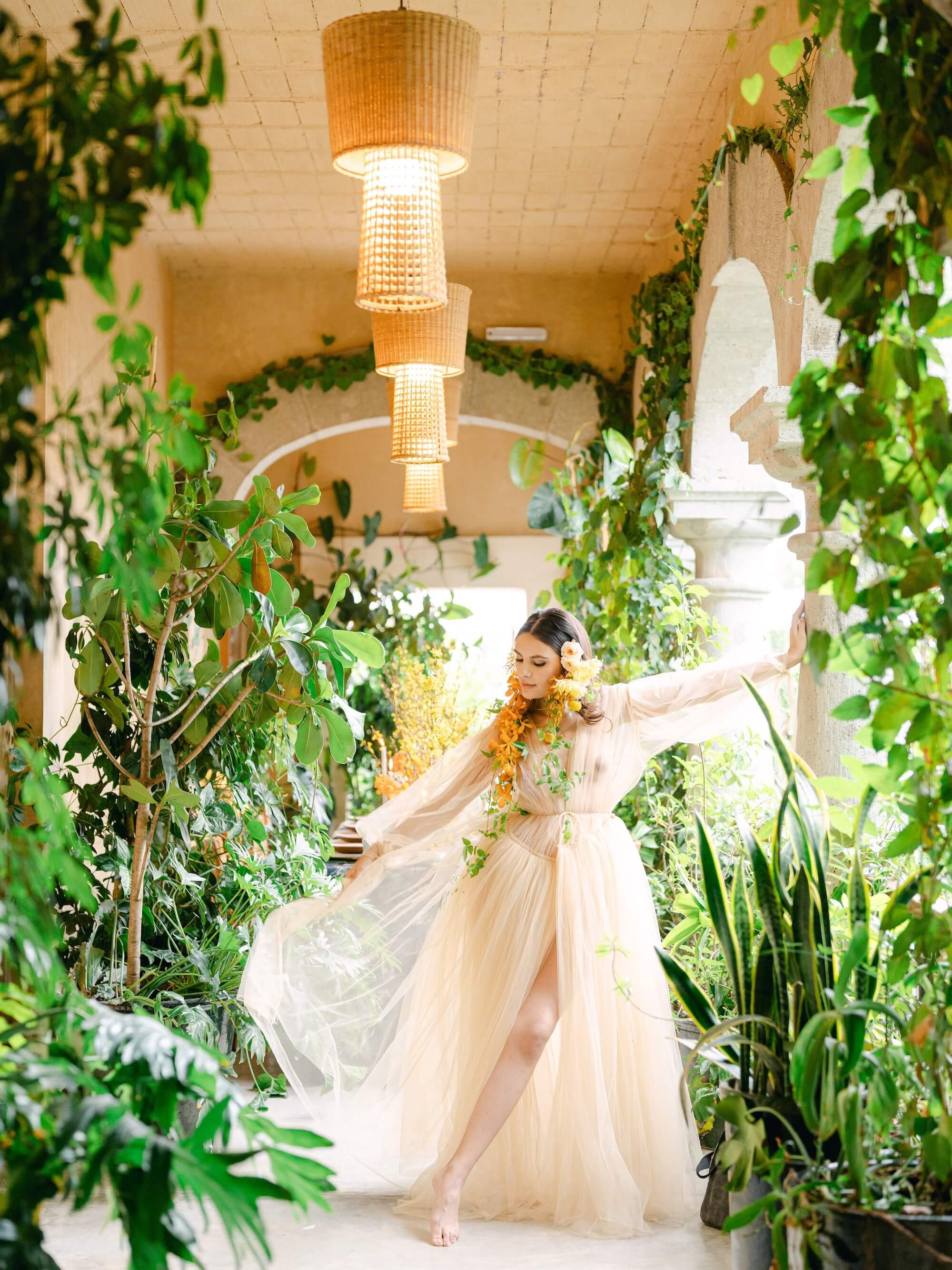 artistic floral styling with yellow blooms and organic greenery in luxury wedding setting