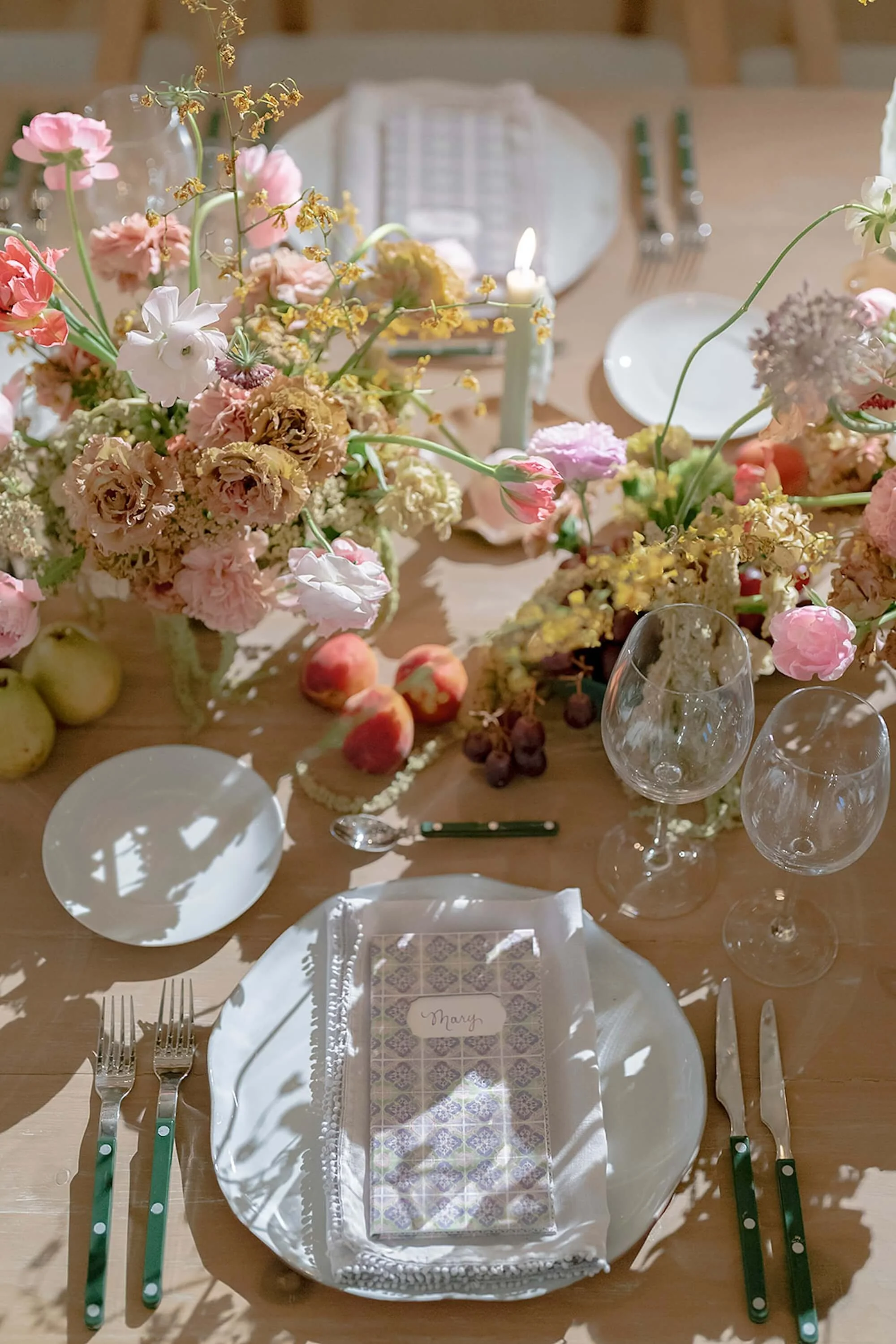 structured floral styling softened by organic elements