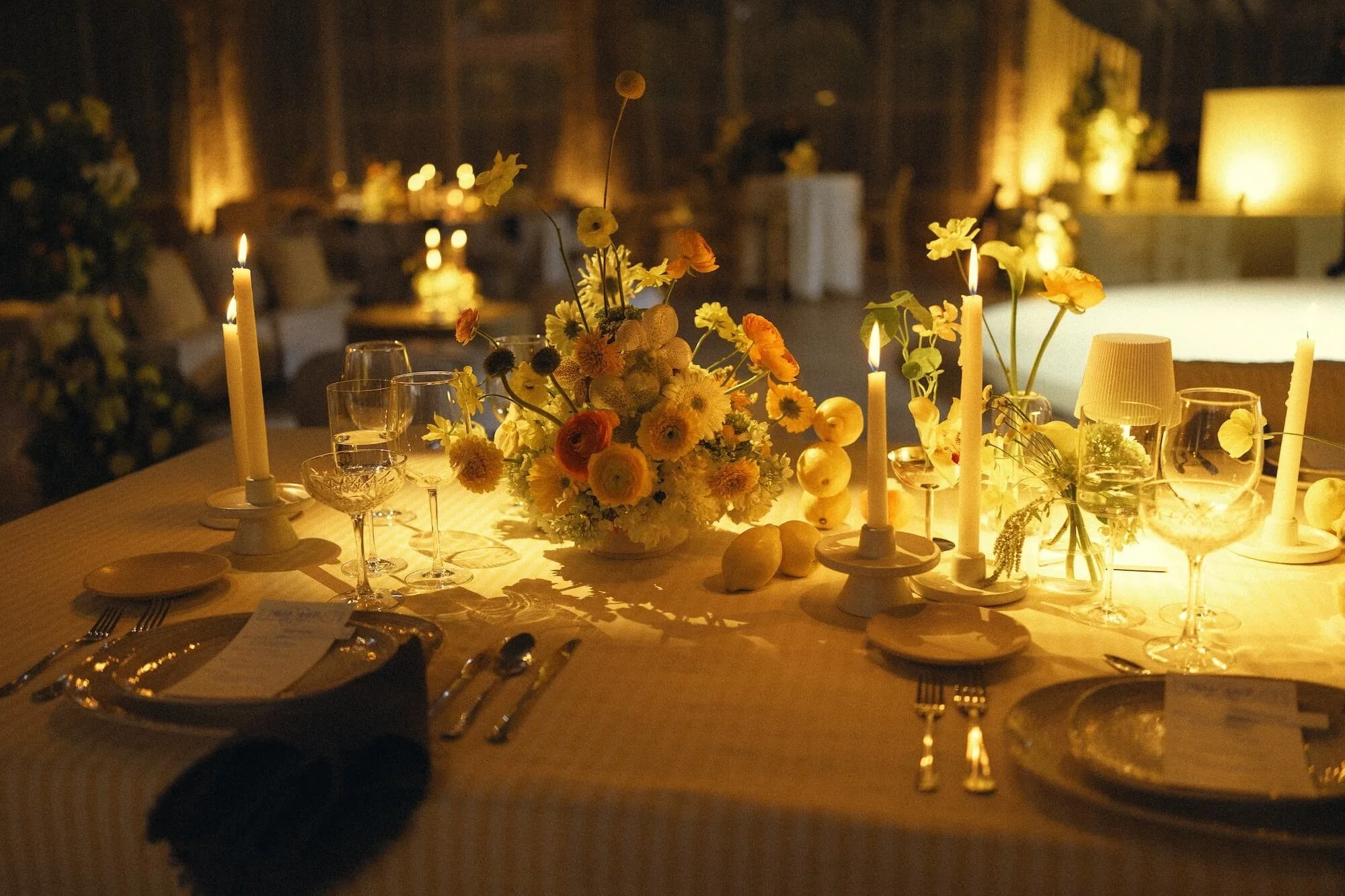 guests gathered within a space softened by florals