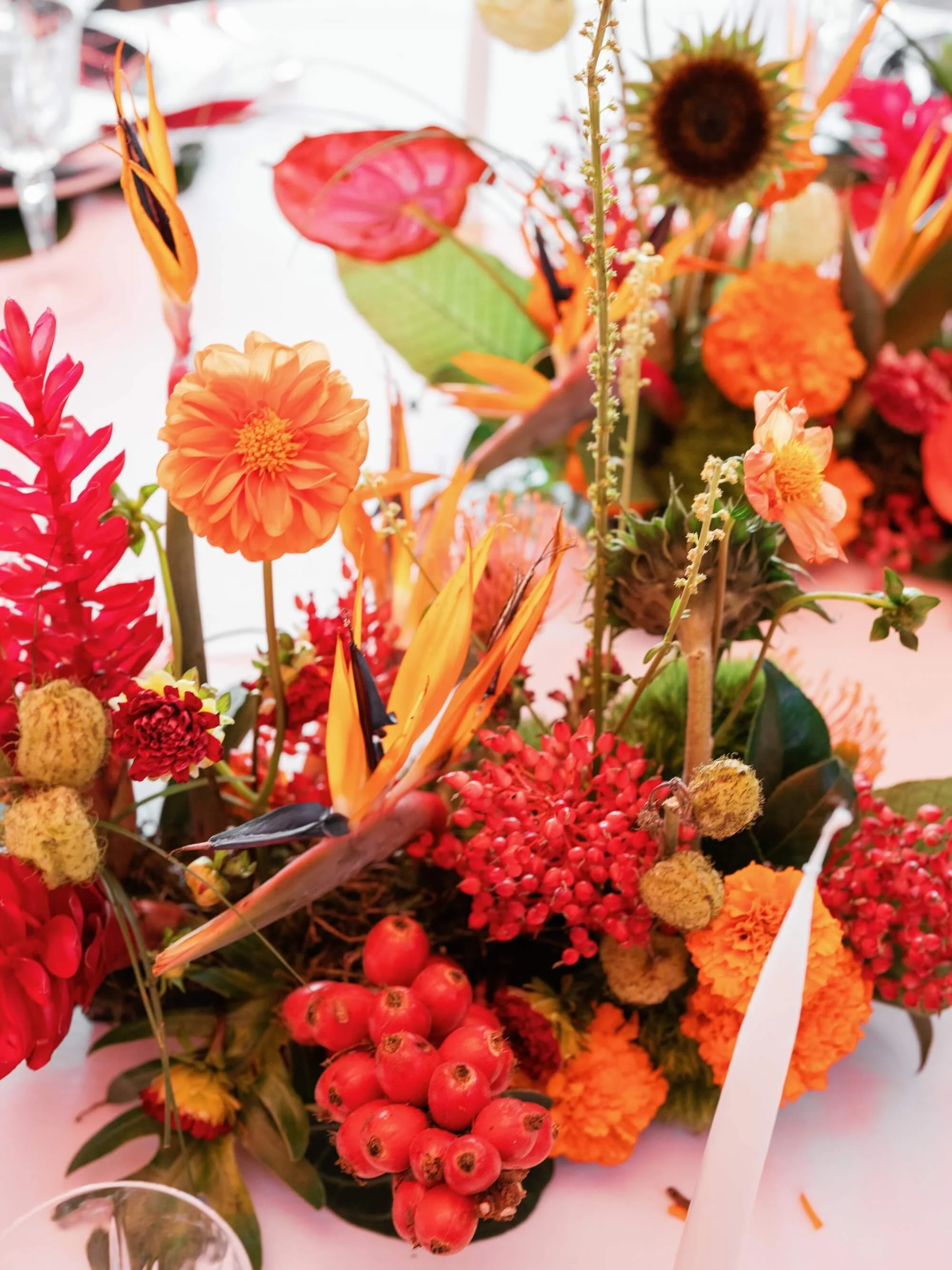 guests gathered around a softly styled floral dinner setting