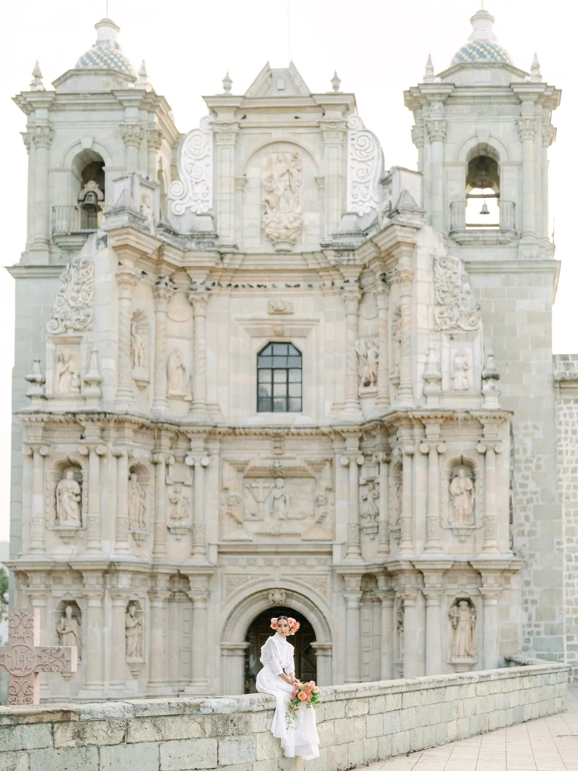 fine art wedding bride in couture gown with sculptural floral bouquet Mexico destination wedding