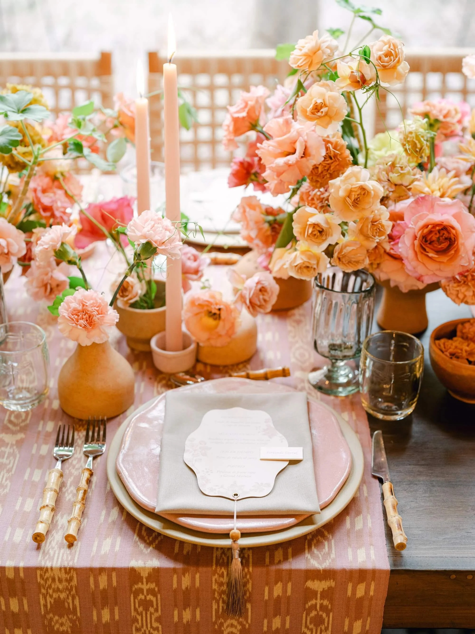 wedding decor with hanging woven lamps and lush plants in San Miguel de Allende