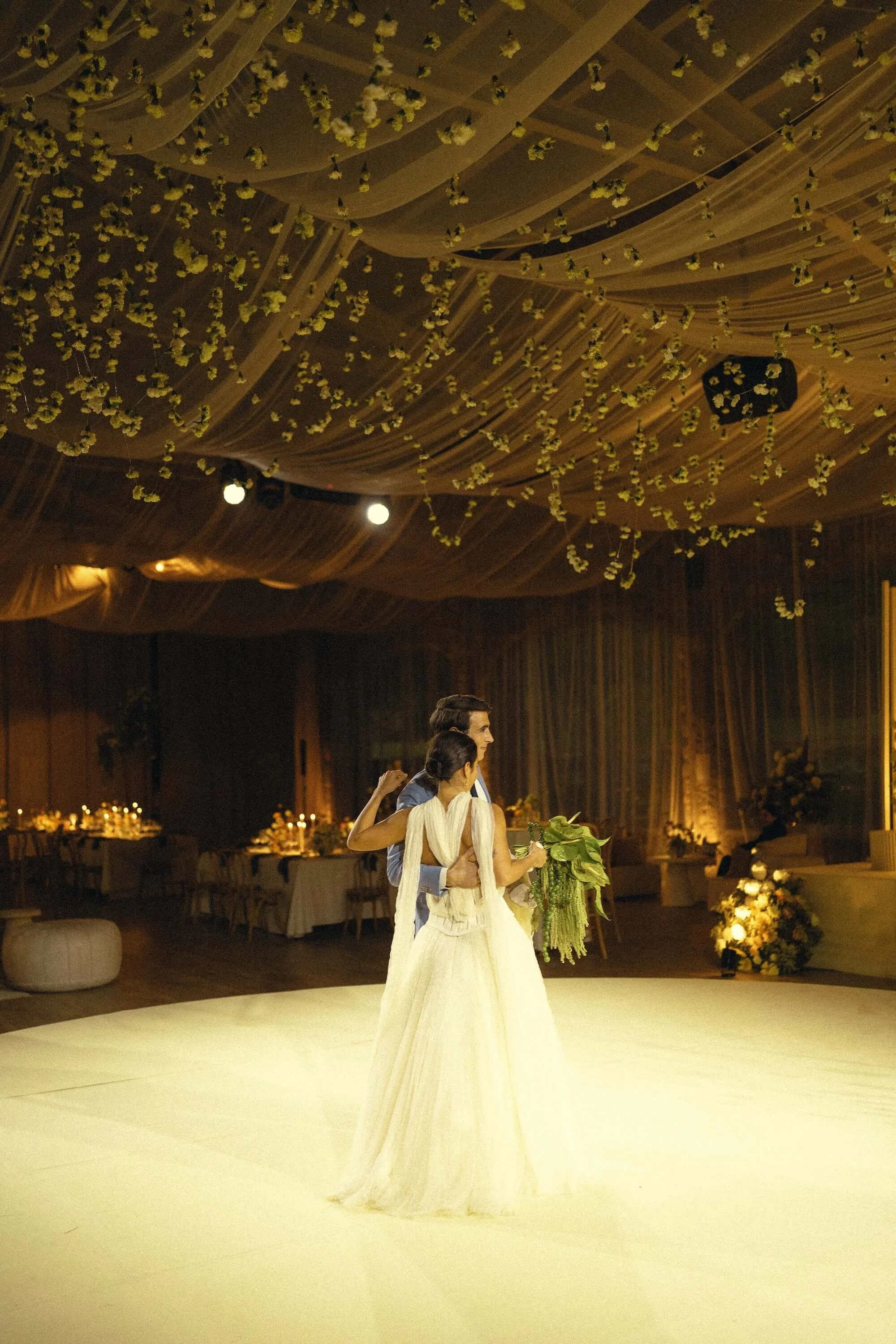 vows exchanged in a setting defined by floral harmony