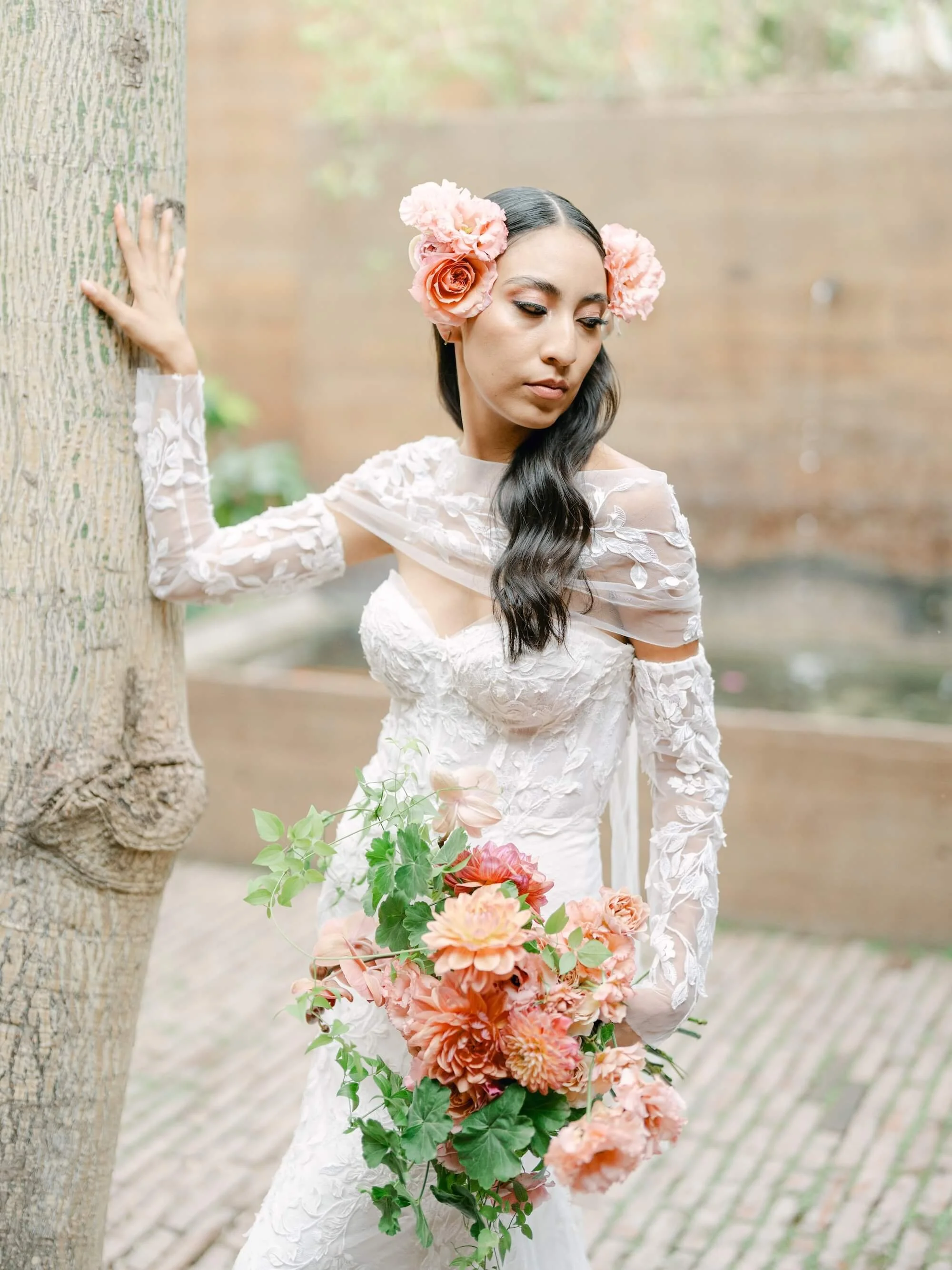 tropical luxury wedding setup with immersive greenery and refined floral composition