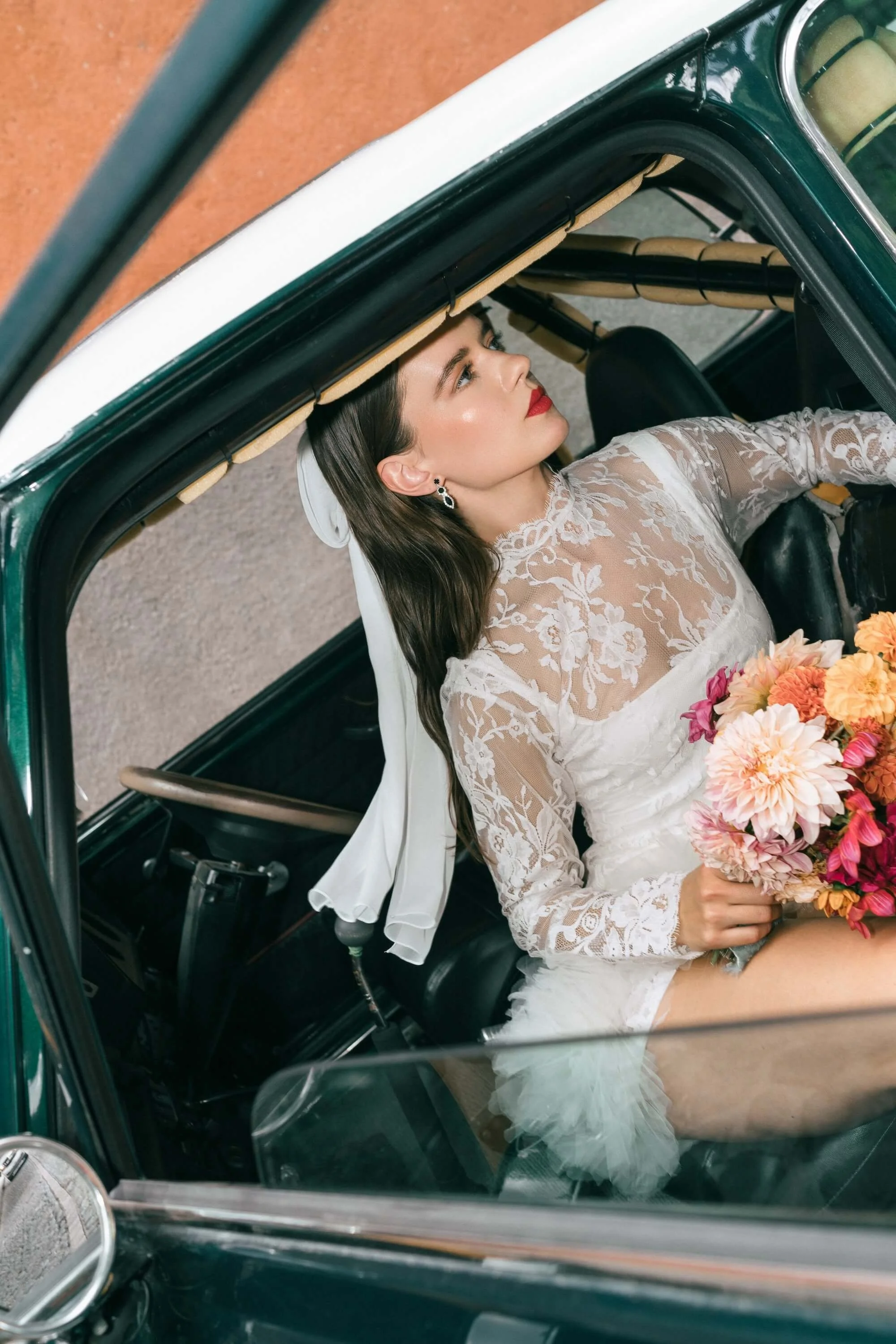 colorful wedding tablescape with vibrant floral arrangements and candles