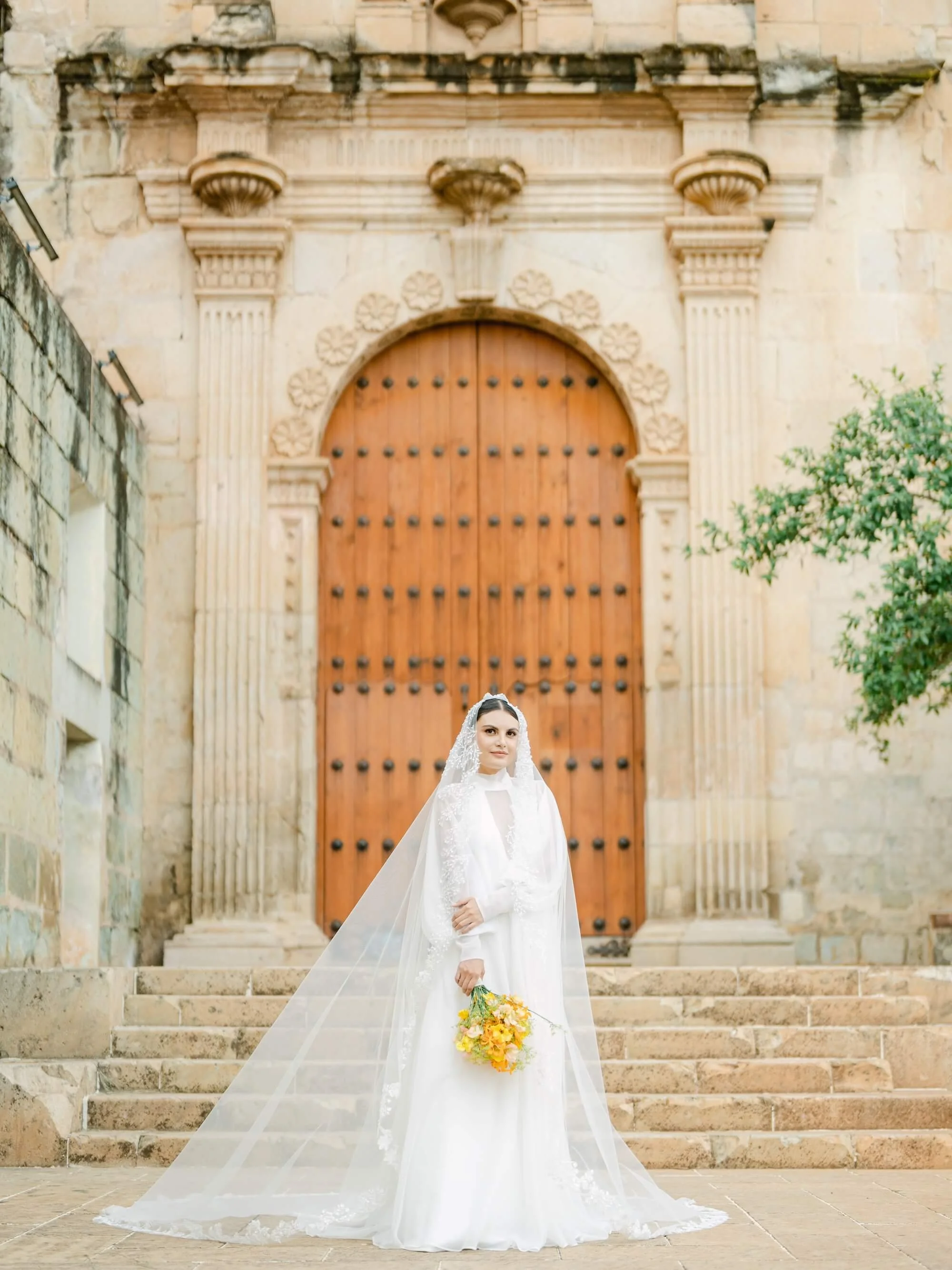 editorial bridal portrait with organic bouquet and soft movement aesthetic