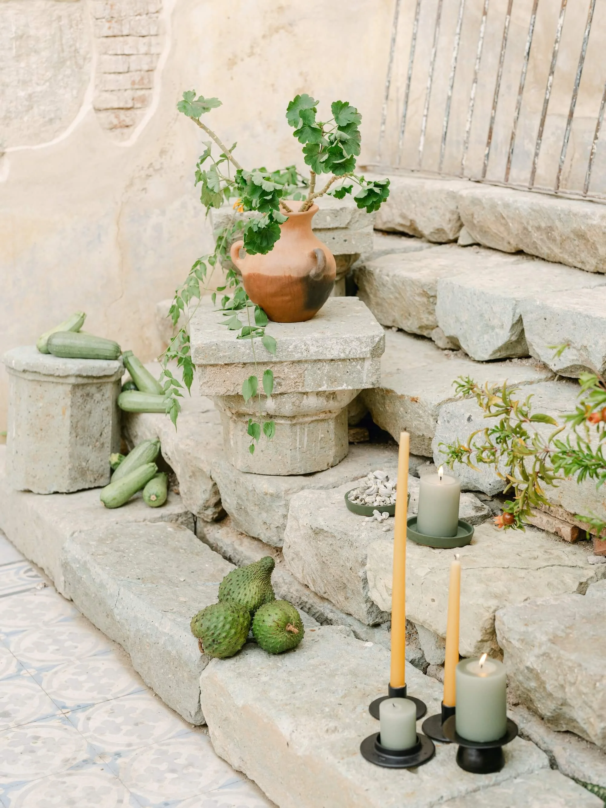 destination wedding reception table with organic floral design and layered greenery
