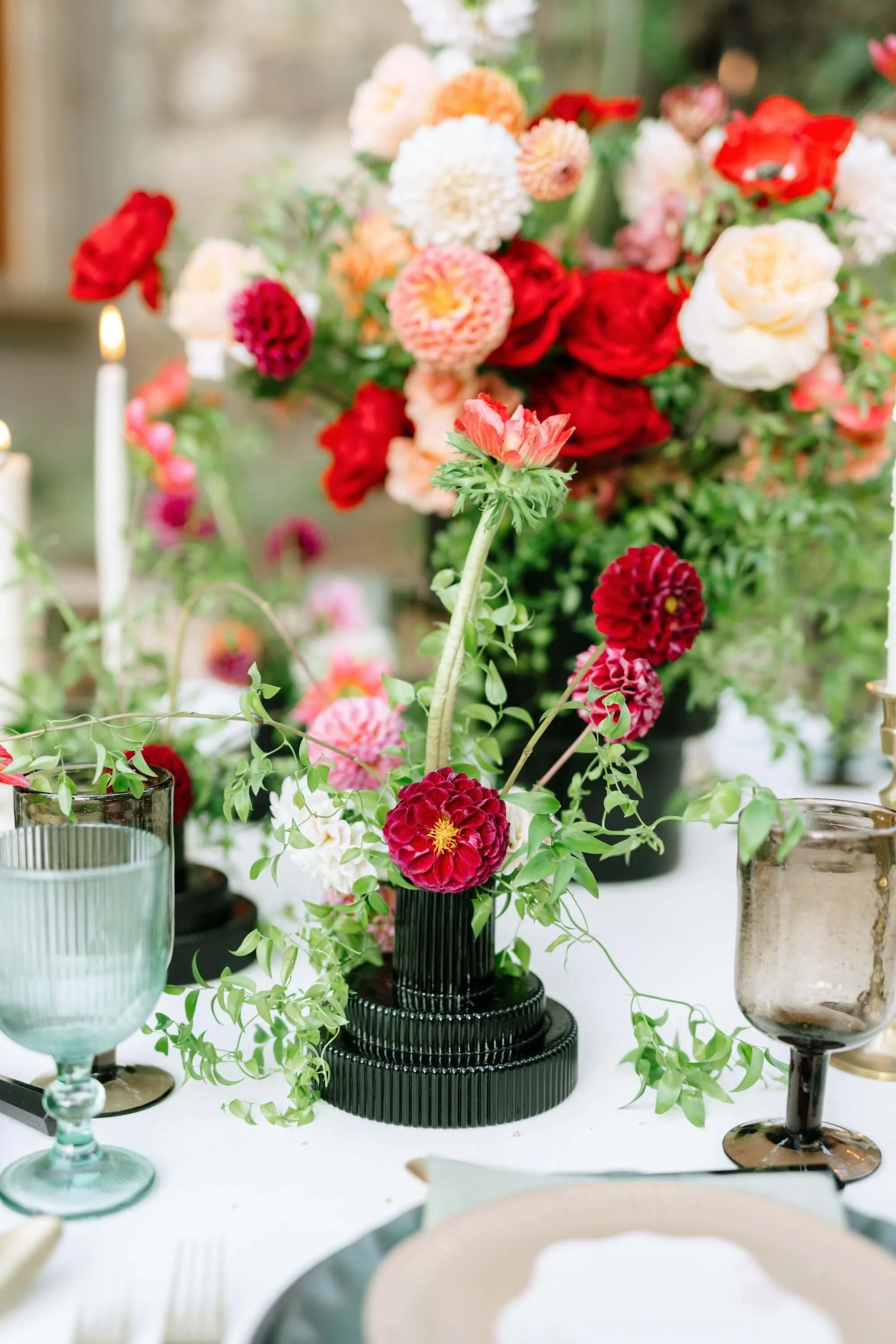 Elegant reception table styling with white linens and garden-inspired florals
