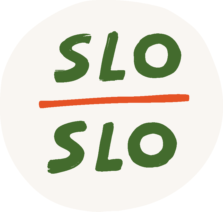Circular logo with a cream-colored background. The word ‘SLO’ appears at the top in forest green, and the word ‘SLO’ appears at the bottom in forest green, separated by a horizontal orange line running across the middle of the circle.