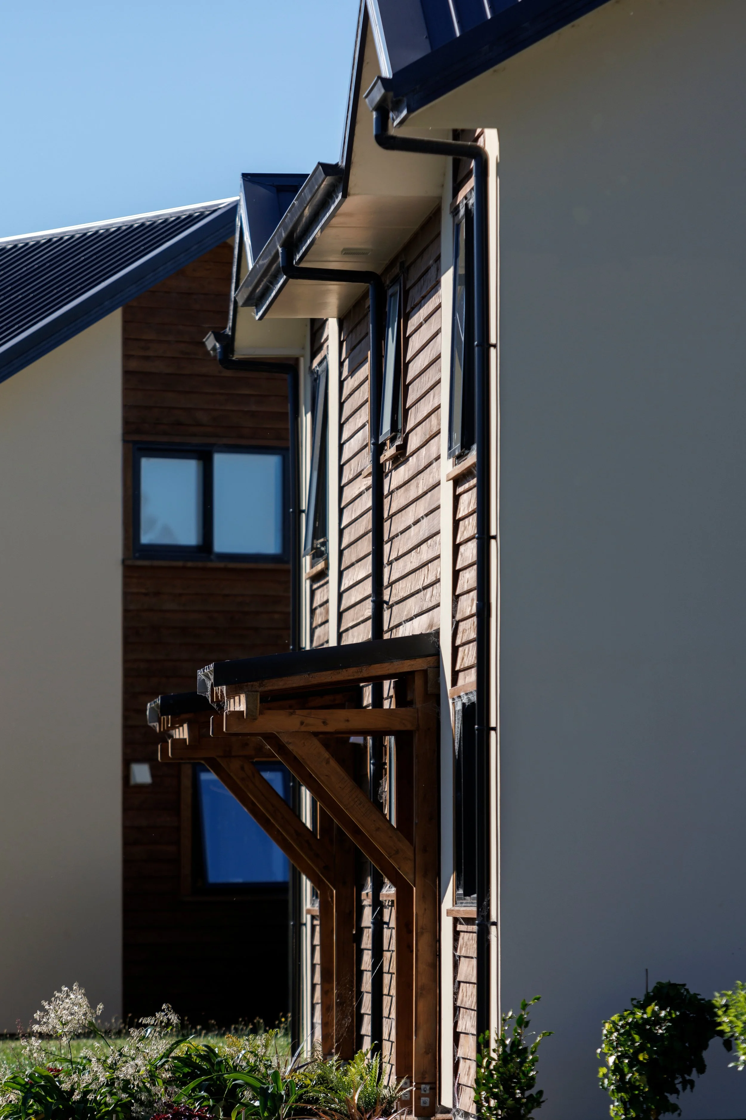 7Takaka Cohousing_Exterior Duplex Entrances_Virginia Woolf_7.jpg
