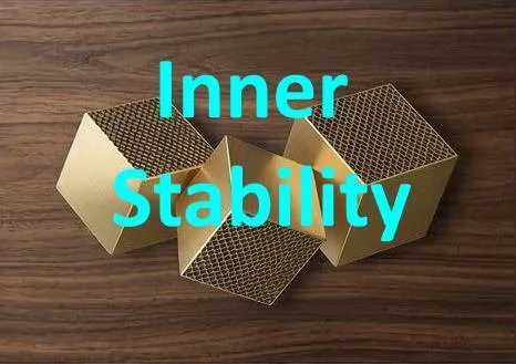 Four cardboard boxes with honeycomb structure inside, arranged on a wooden surface, with the words 'Inner Stability' written in blue text over the image.