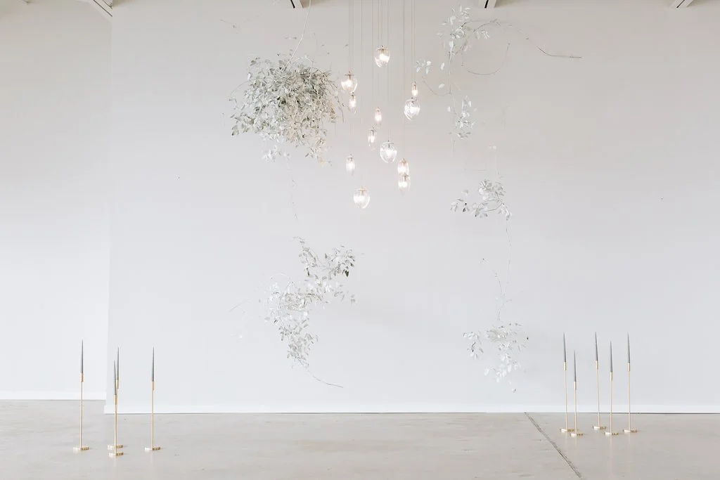 Small wedding backdrop with candles at holden room minneapolis