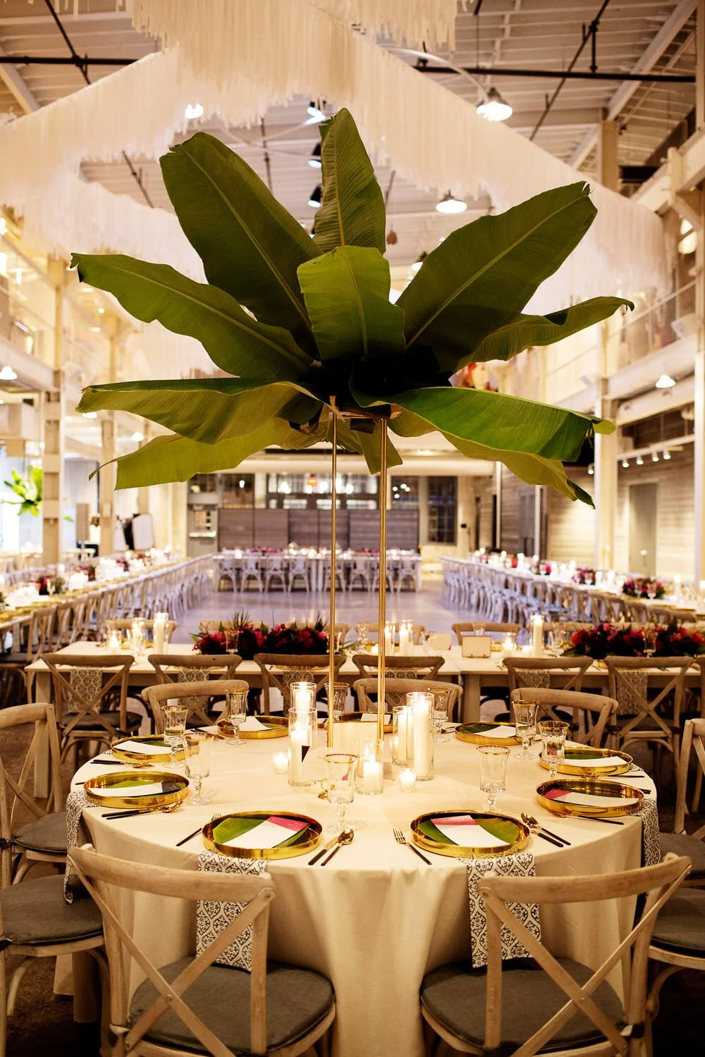 Modern gold wedding decor and palm tree centerpiece at The Machine Shop, Minneapolis, Minnesota - event design by Rocket Science Events, photo by Photogen Inc.