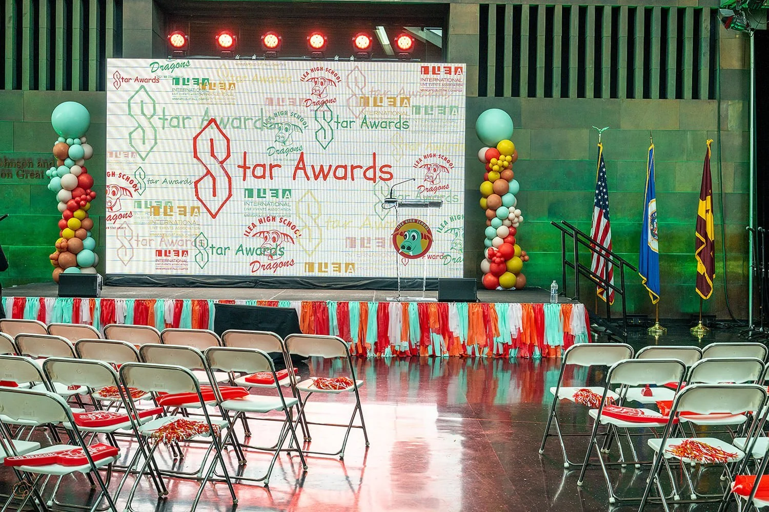 High School themed custom-designed auditorium area for the award distribution. High School themed party design, ILEA Minnesota Star Awards, Designed by Rocket Science Events.