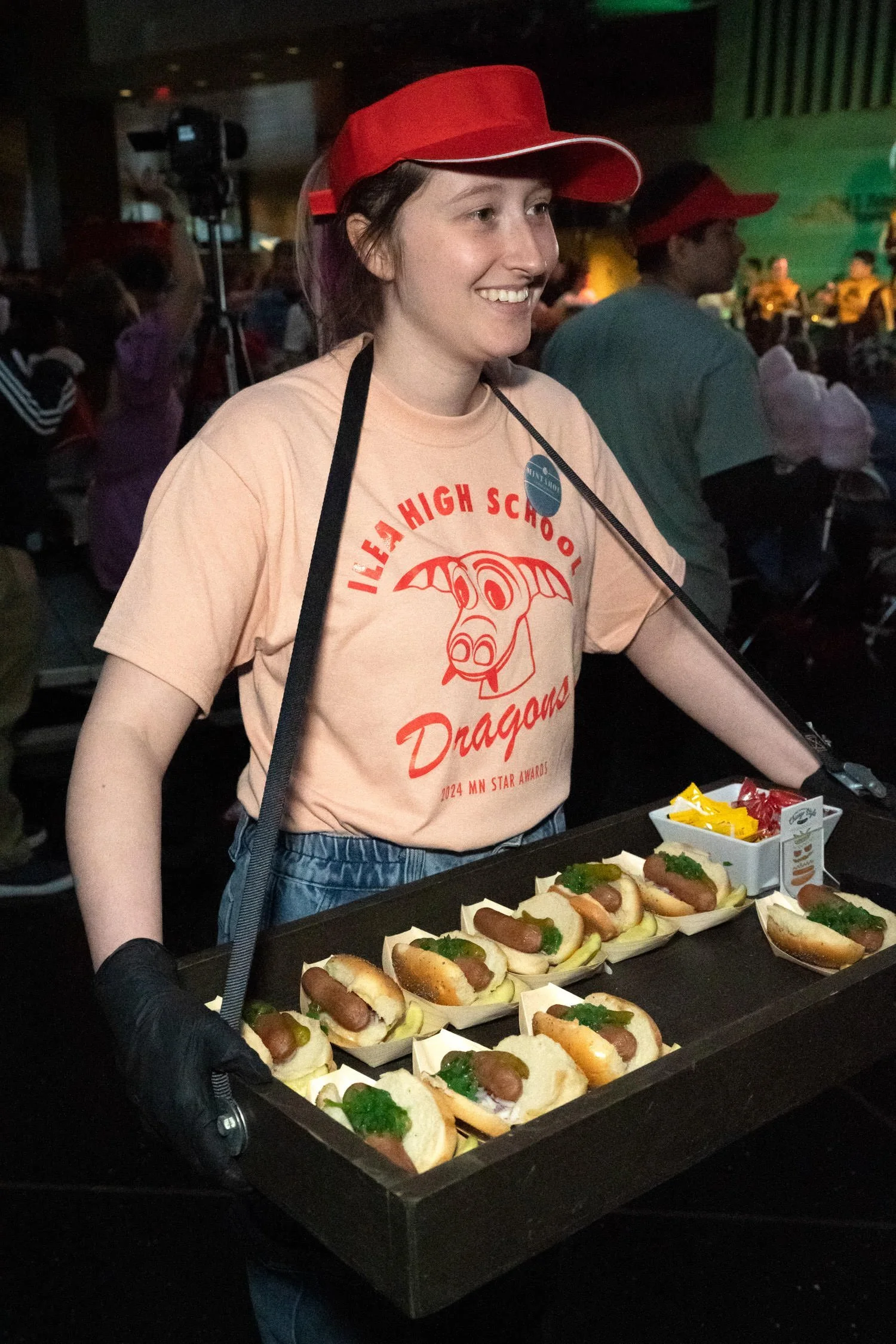High School themed custom-designed football game food vendor waitstaff. High School themed party design, ILEA Minnesota Star Awards, Planned by Rocket Science Events.