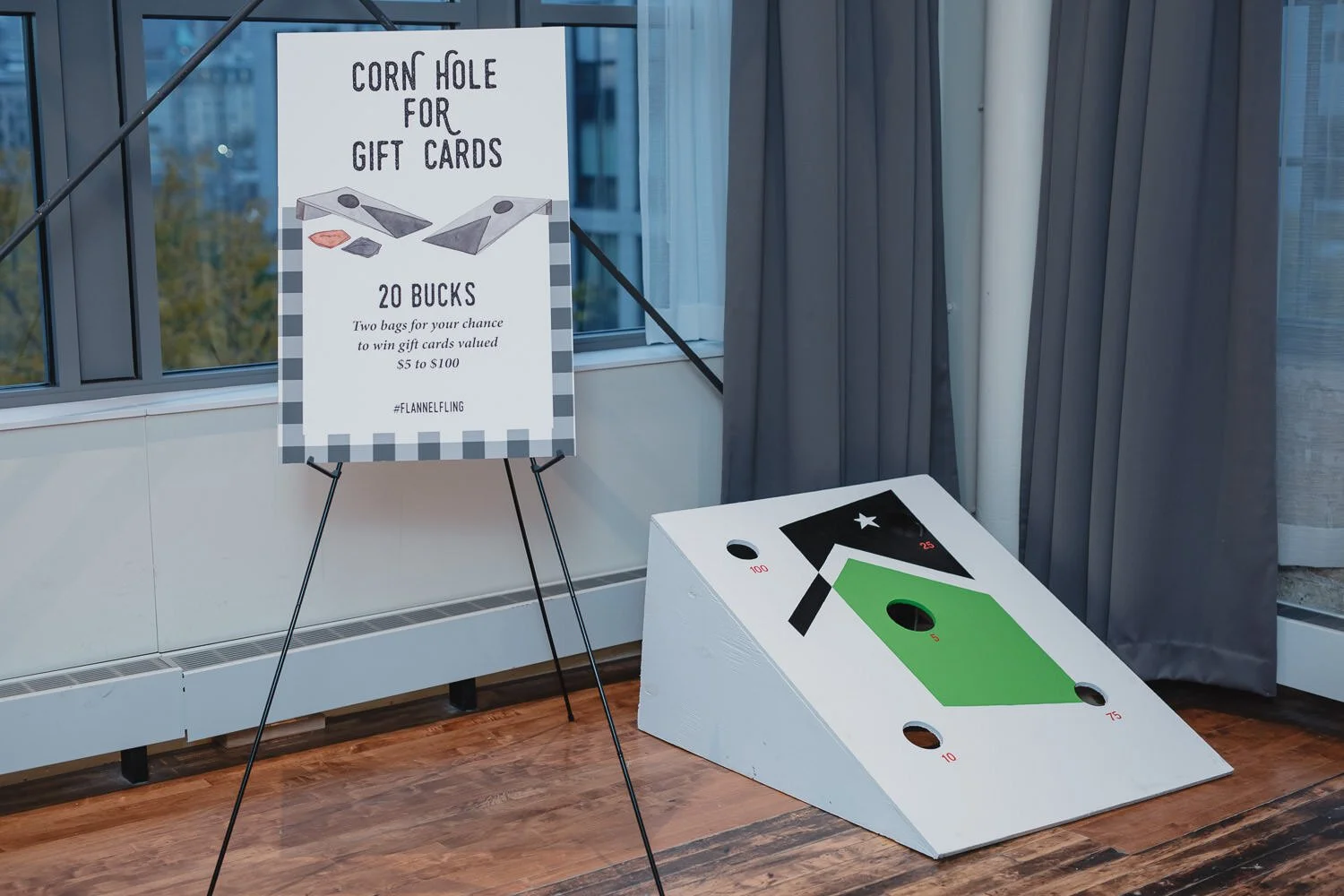 corn hole game to win gift cards for Americana farm themed event