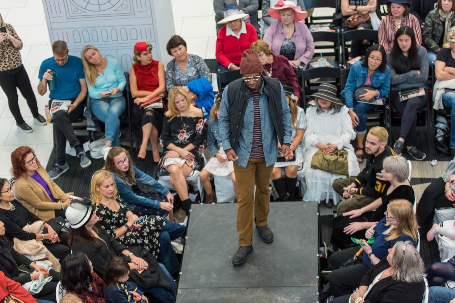 Male model walks the catwalk at British inspired fashion event